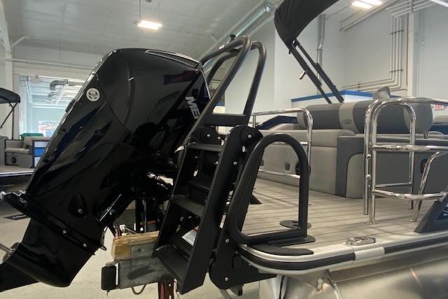 2026 Bentley Pontoons Elite 223 Swingback with powerful outboard motor and sleek design.