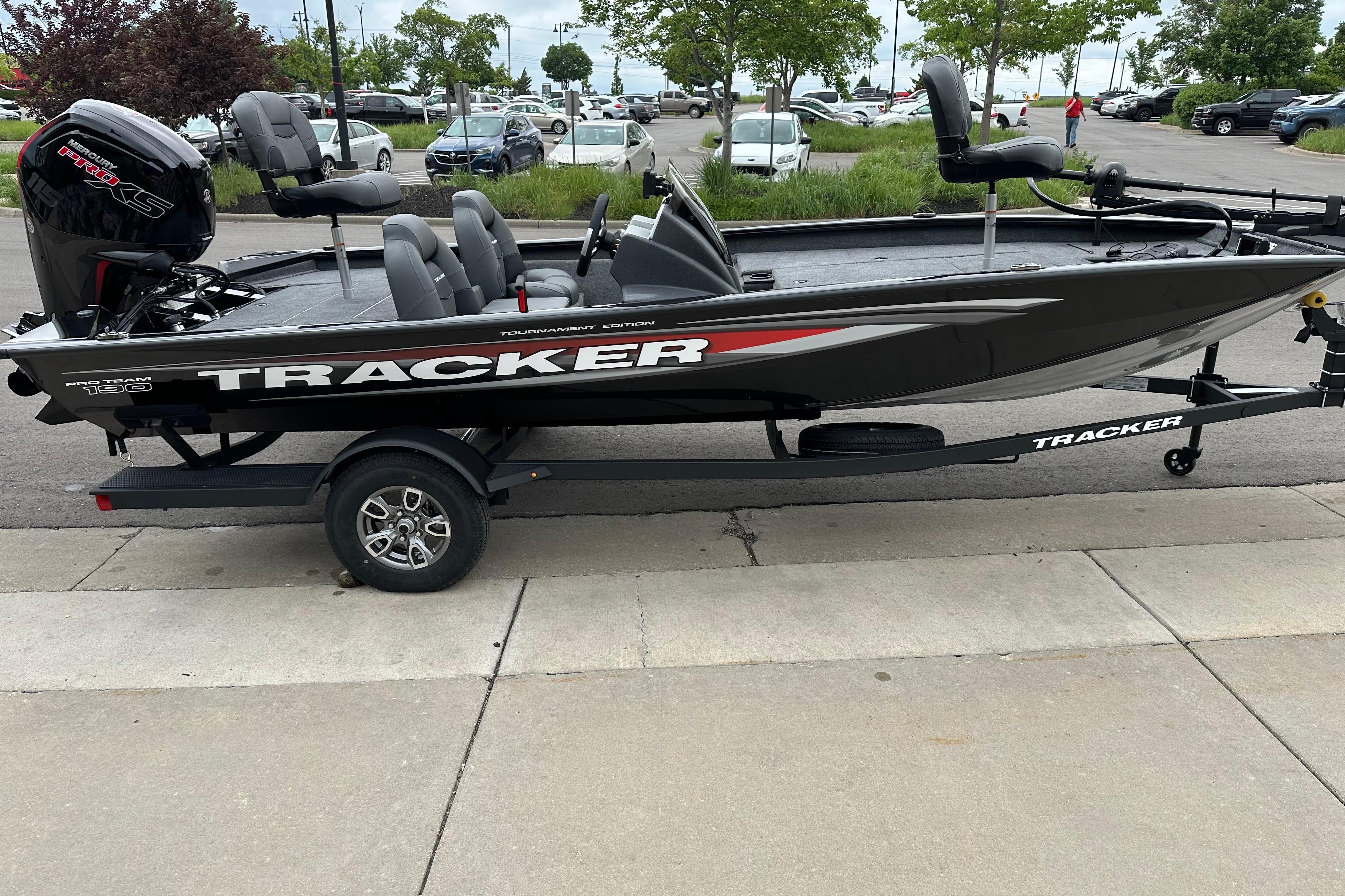 2026 Tracker Pro Team 190 boat on trailer in parking lot.
