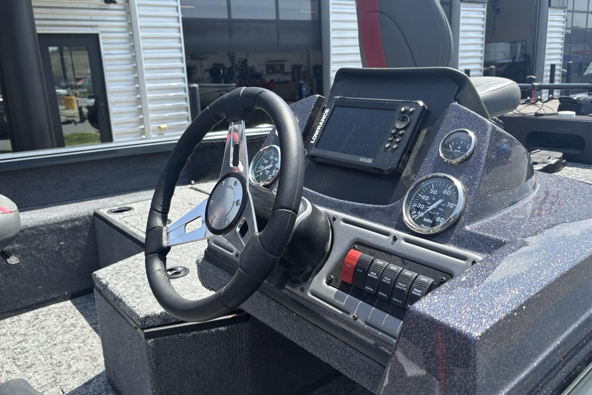 2026 Ranger VS1782SC Angler boat dashboard with steering wheel and navigation controls.
