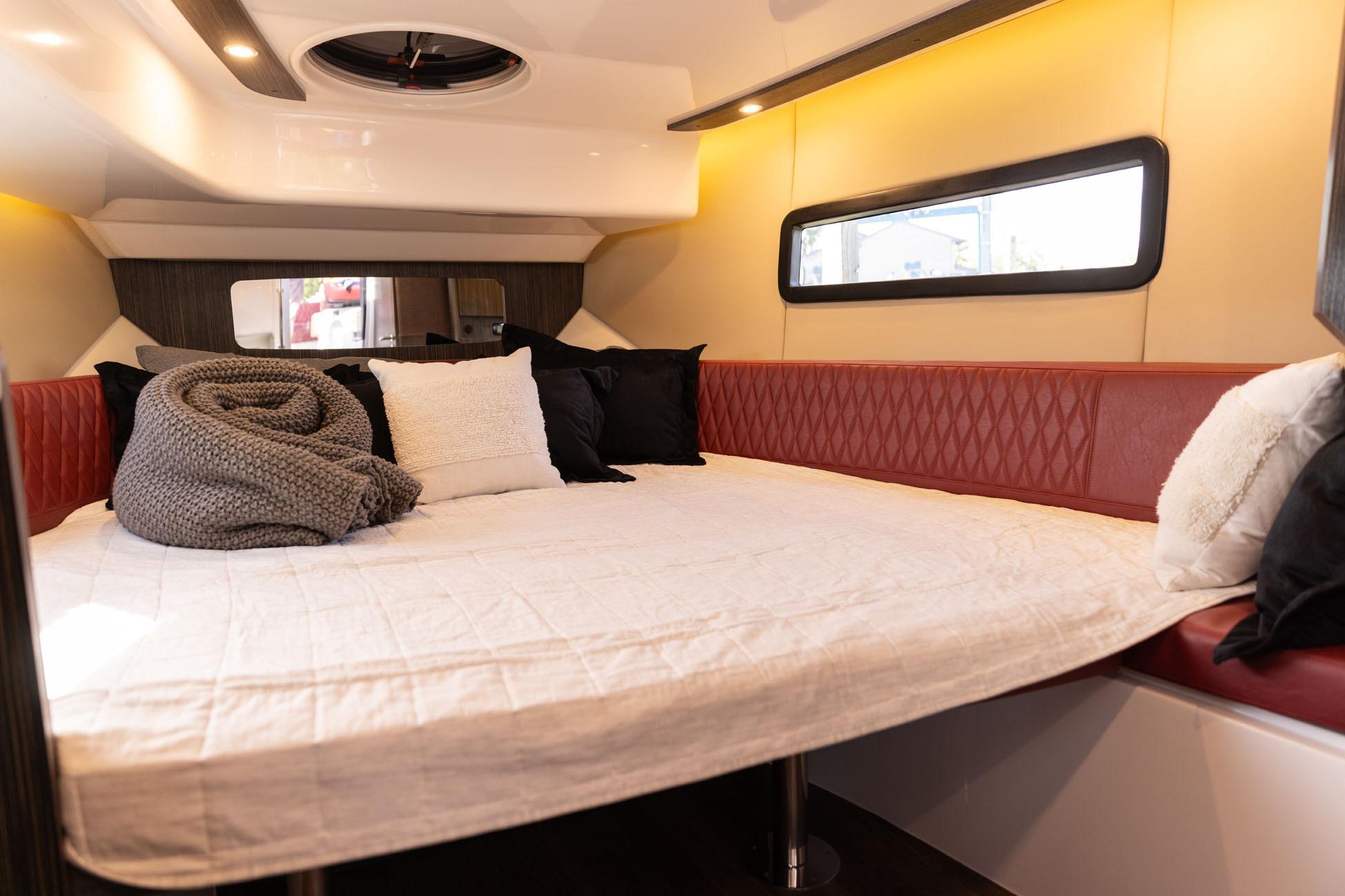 Luxurious interior of 2026 Hanover 387 with cozy bed and modern design.