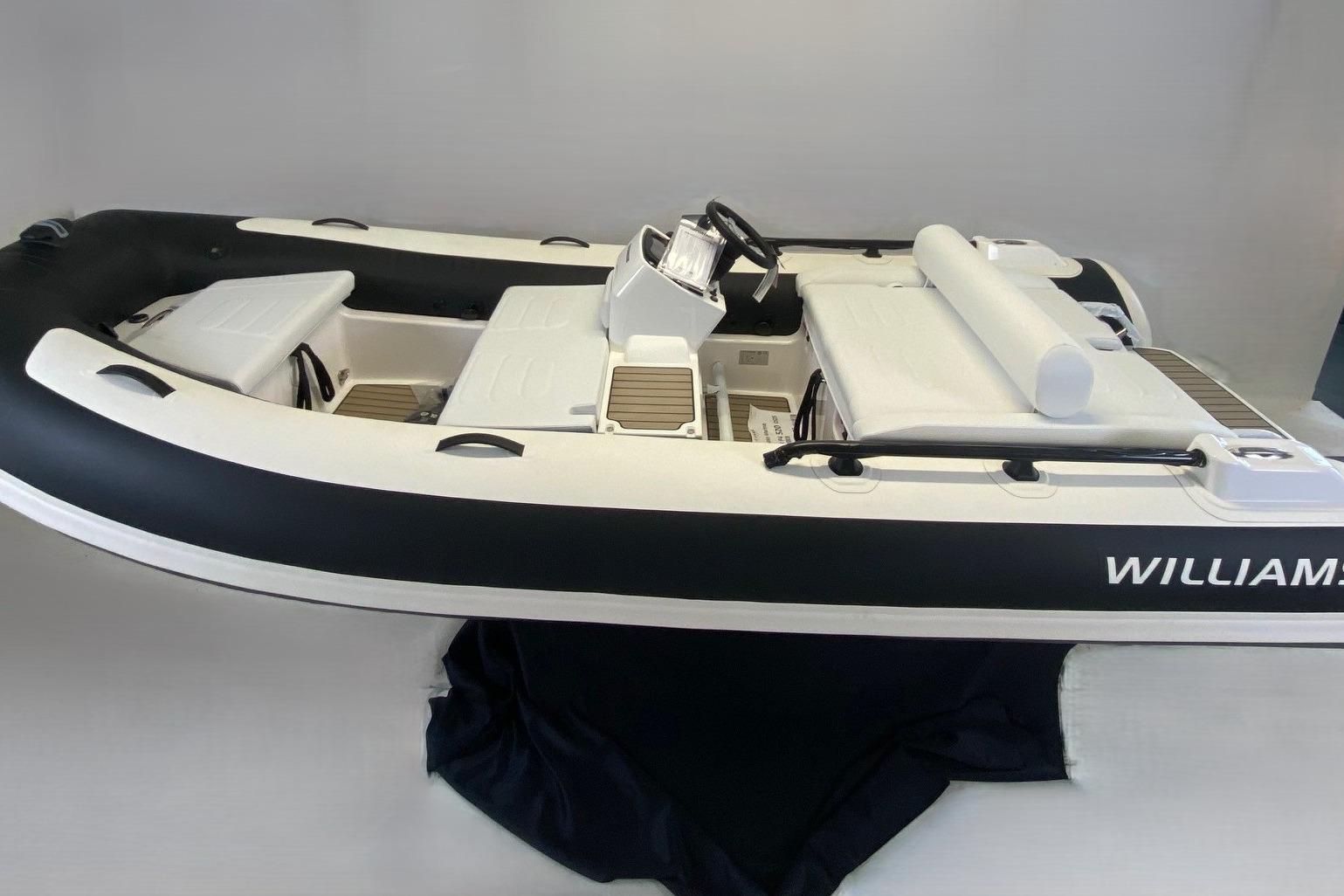 2025 Williams Jet Tenders Sportjet 435, sleek design, black and white color scheme.