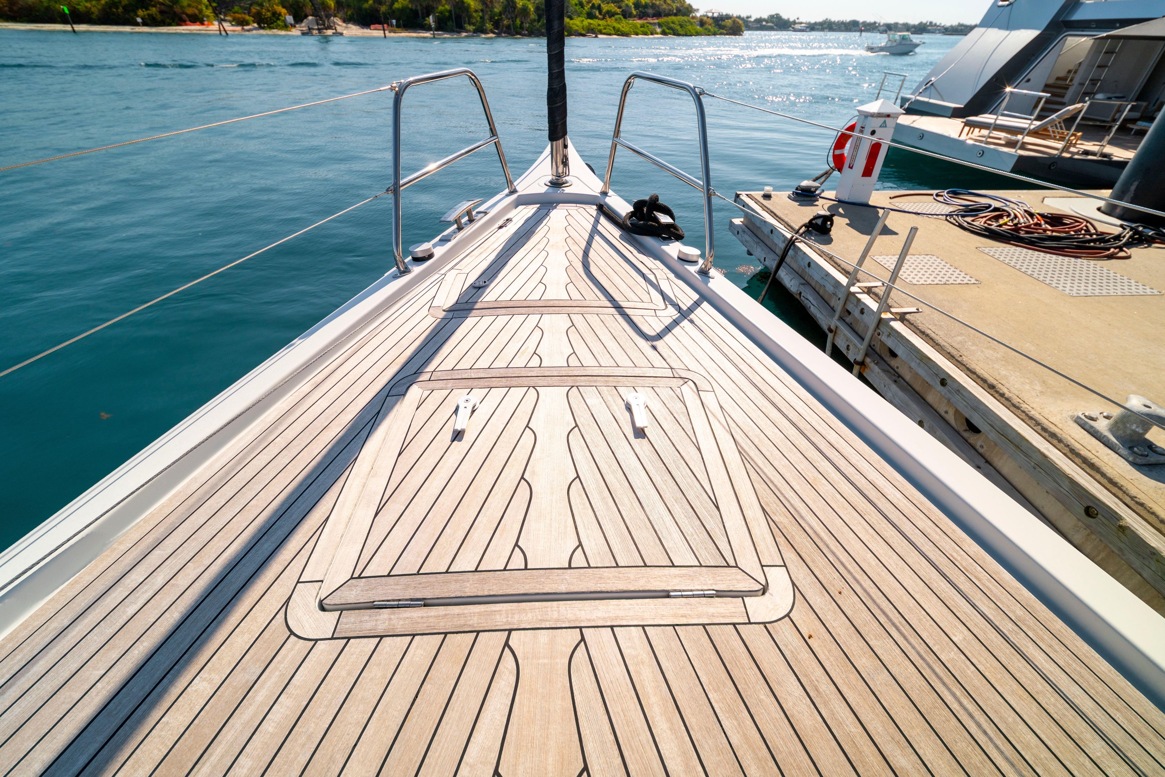 Grand Soleil 58 yacht deck, 2016 model, docked by the water.