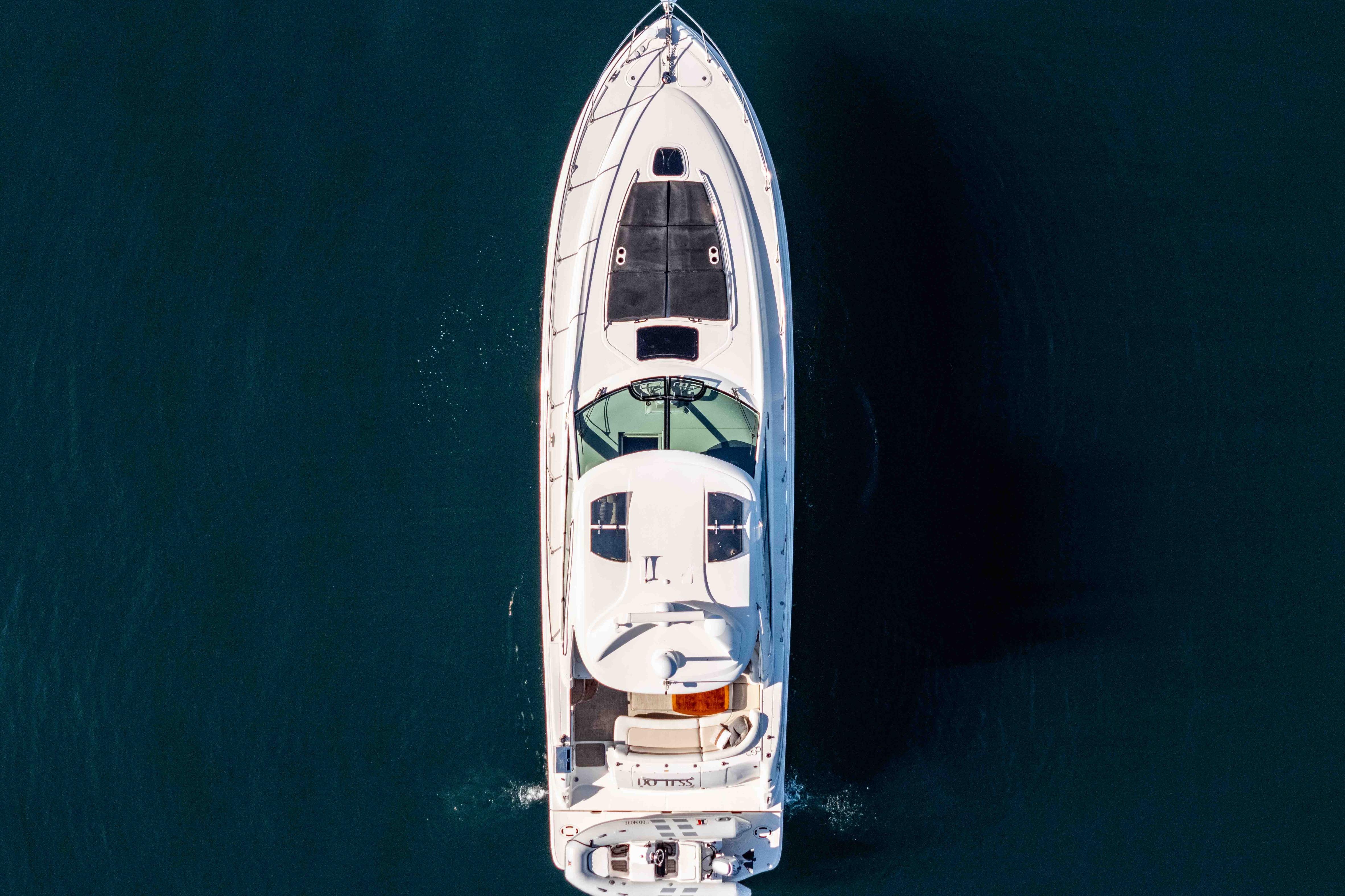 Top view of 2007 Sea Ray 48 Sundancer yacht cruising on open water.