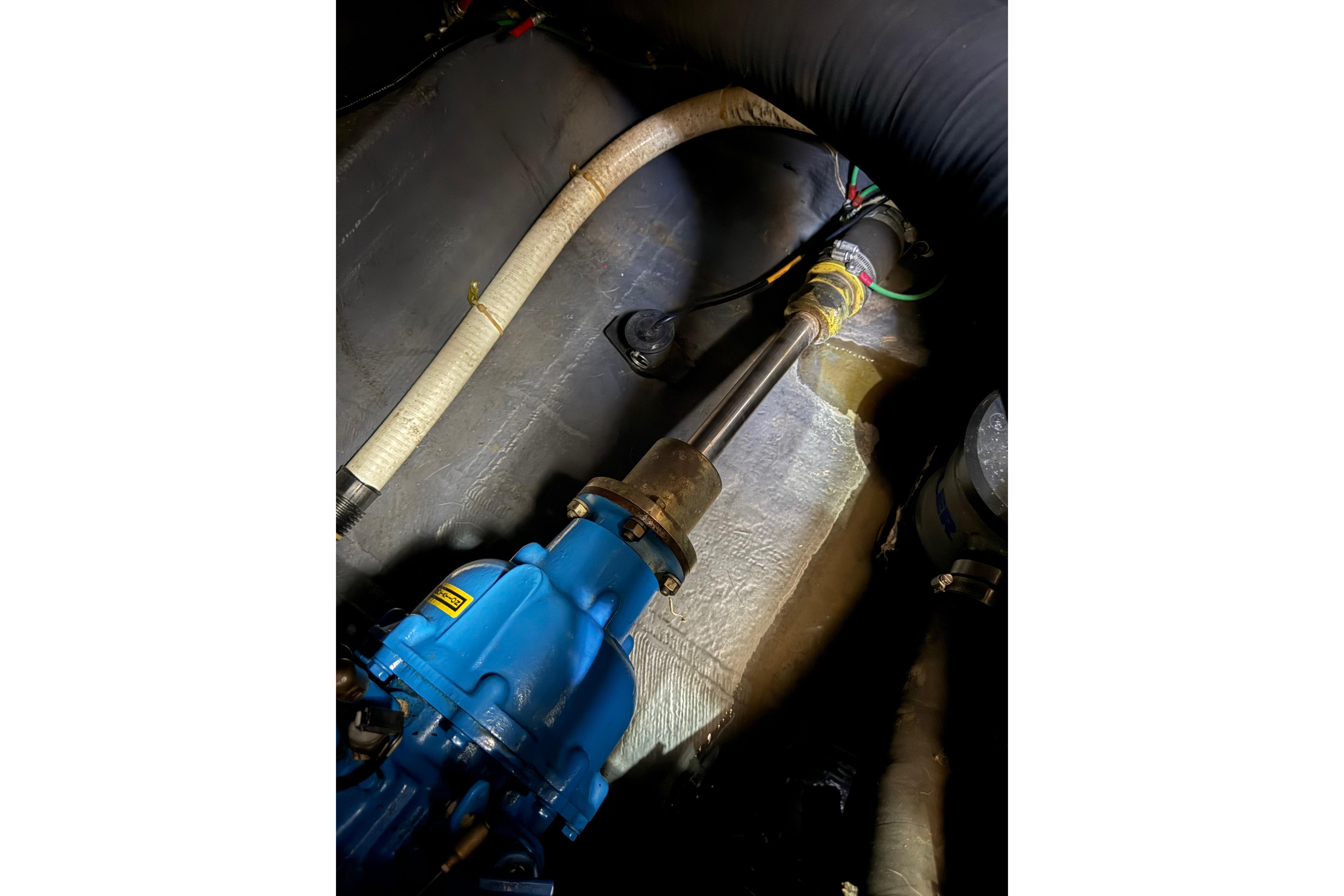 Engine room of 1992 Carver 33 Aft Cabin Motor Yacht, showing mechanical components.