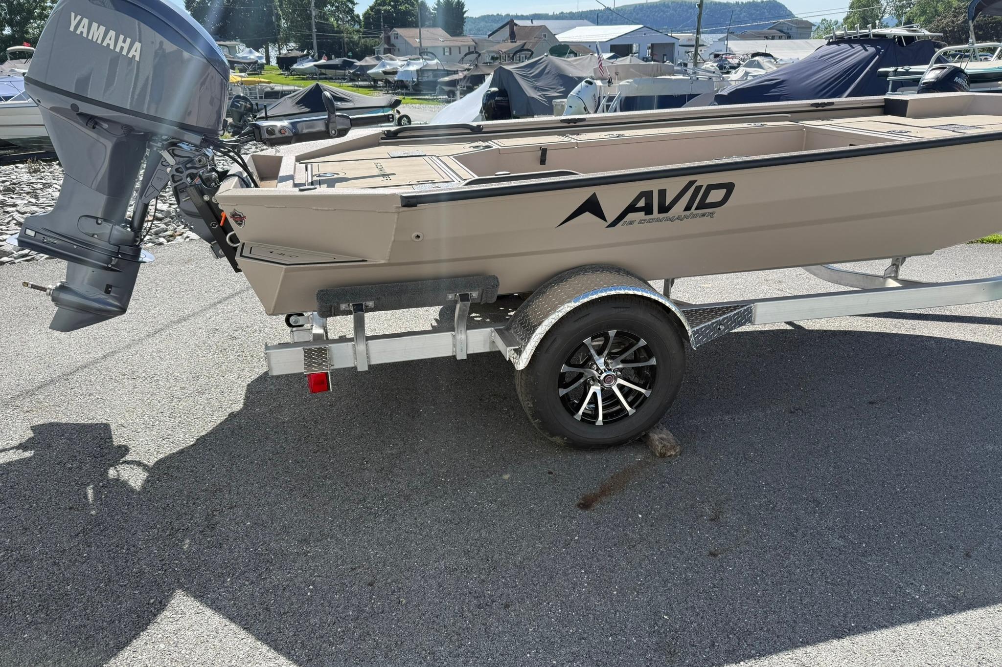 2026 Avid 16 Commander boat on trailer with Yamaha outboard motor.