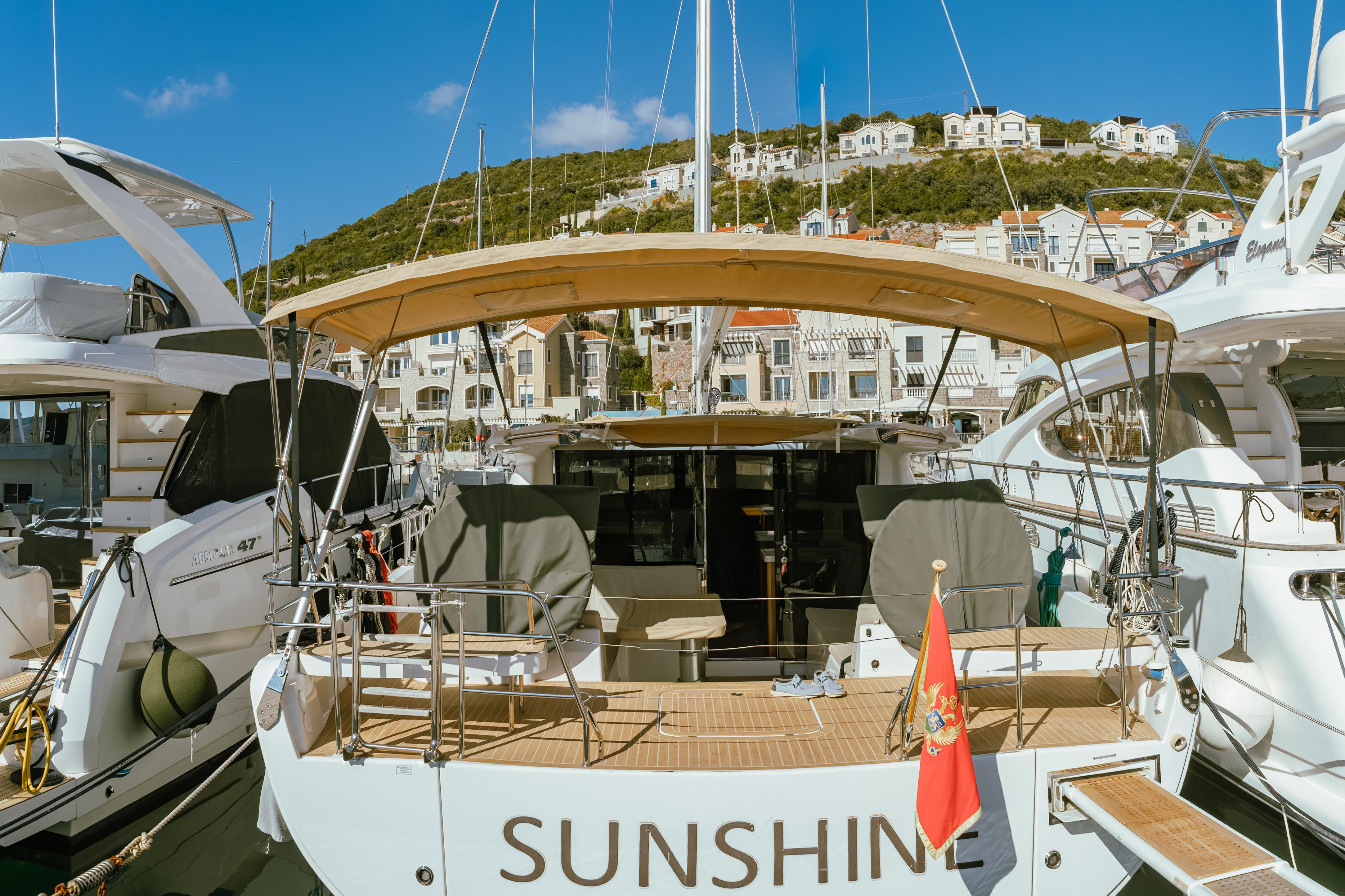 Moody 54 DS yacht "Sunshine" docked in a scenic marina, 2016 model.