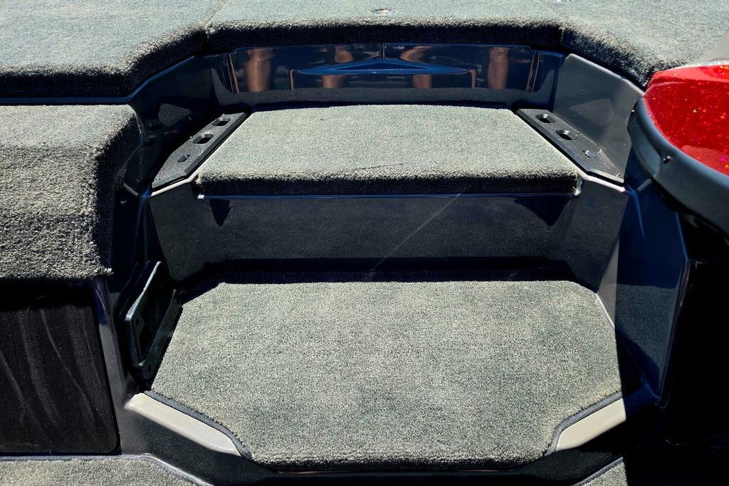 Carpeted deck of 2026 Skeeter ZXE20 boat, featuring durable, non-slip surface.