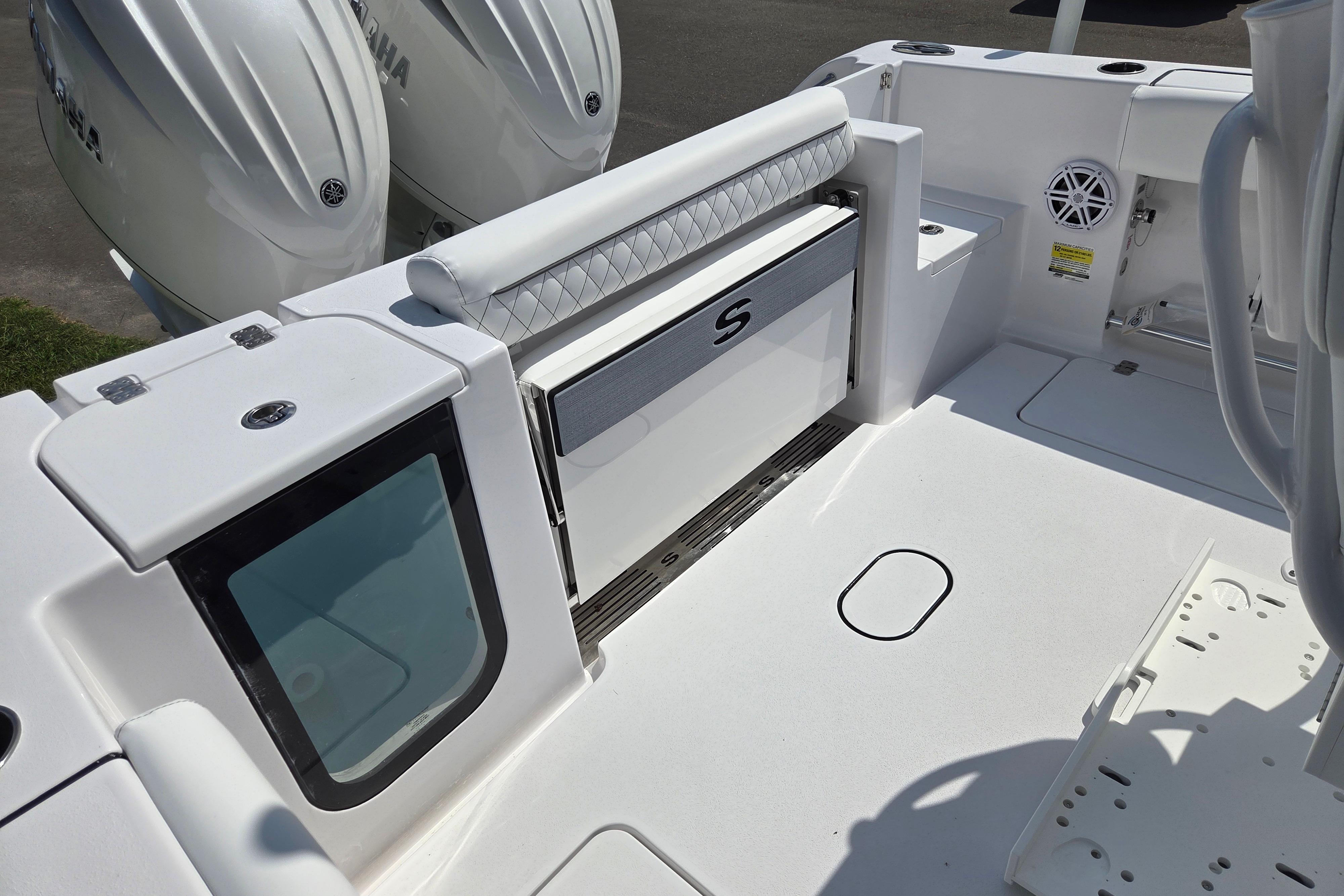 2026 Sportsman Open 252 Center Console boat interior with Yamaha engines.