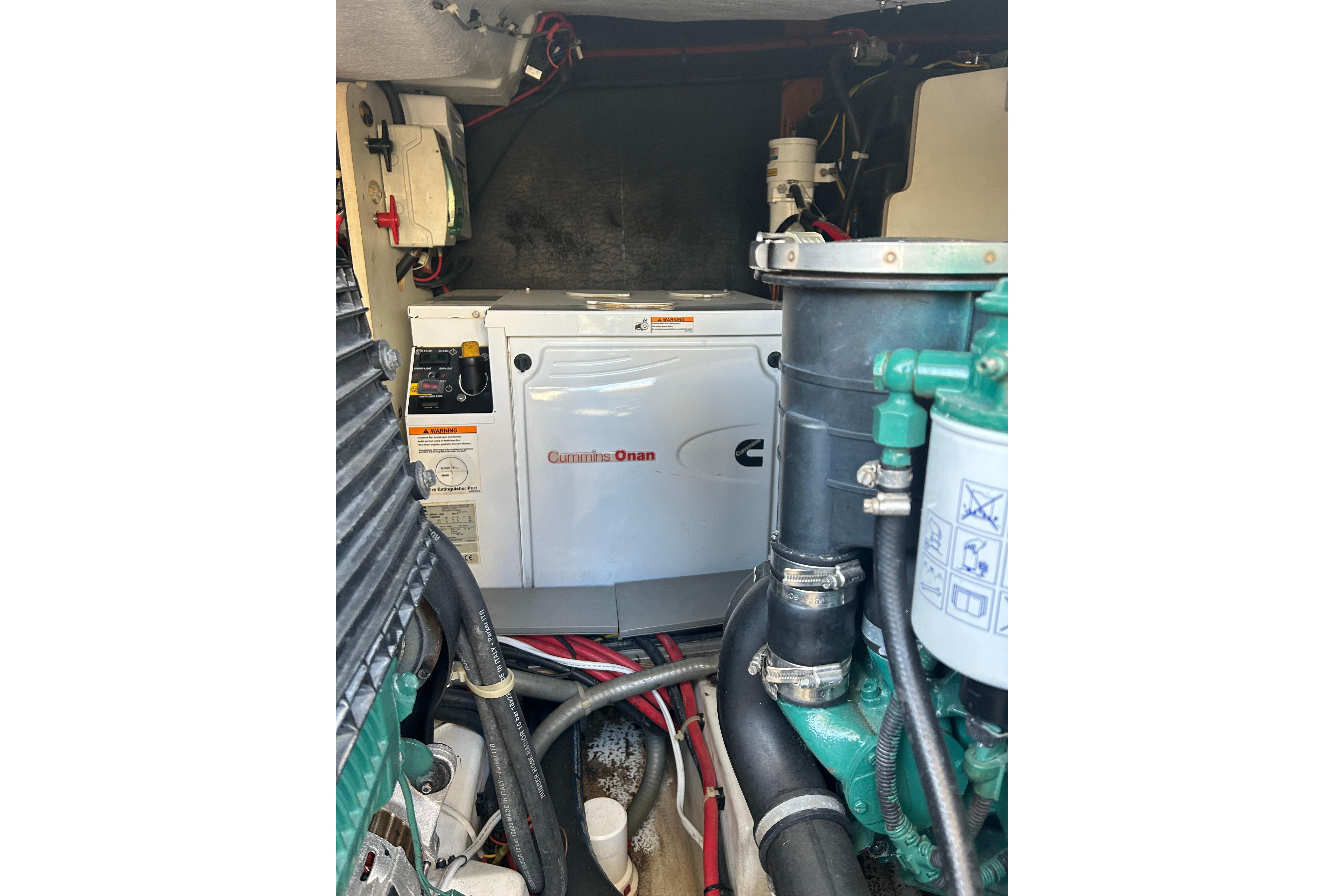 Engine room of 2012 Beneteau Gran Turismo 44 with Cummins Onan generator.