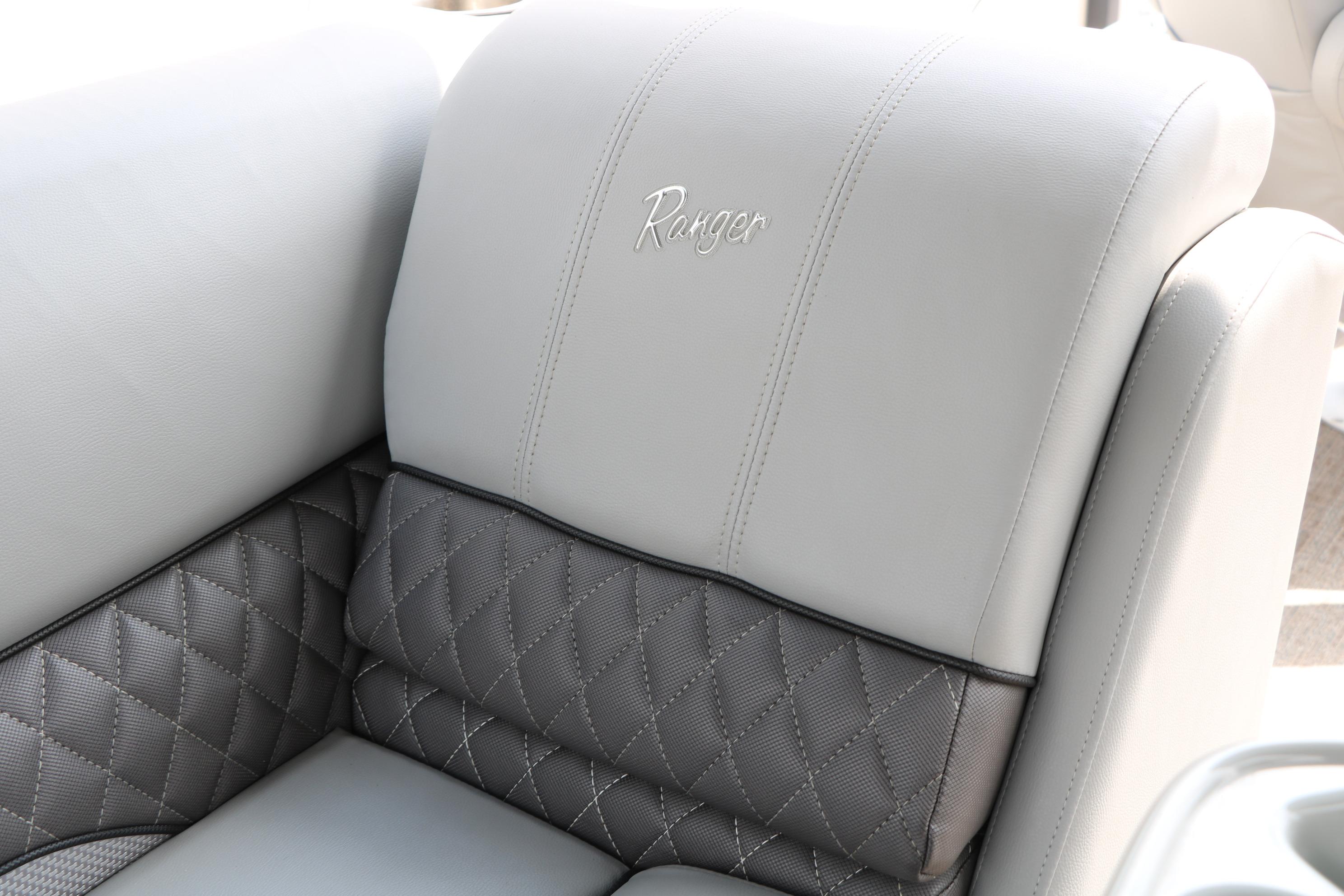 Luxurious 2021 Ranger 223FC boat seat with elegant stitching and embossed logo.