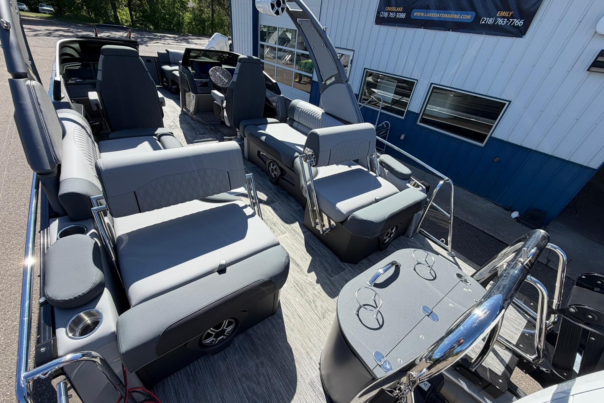 2026 Avalon Excalibur LTD Quad Lounge boat interior with luxurious seating and modern design.