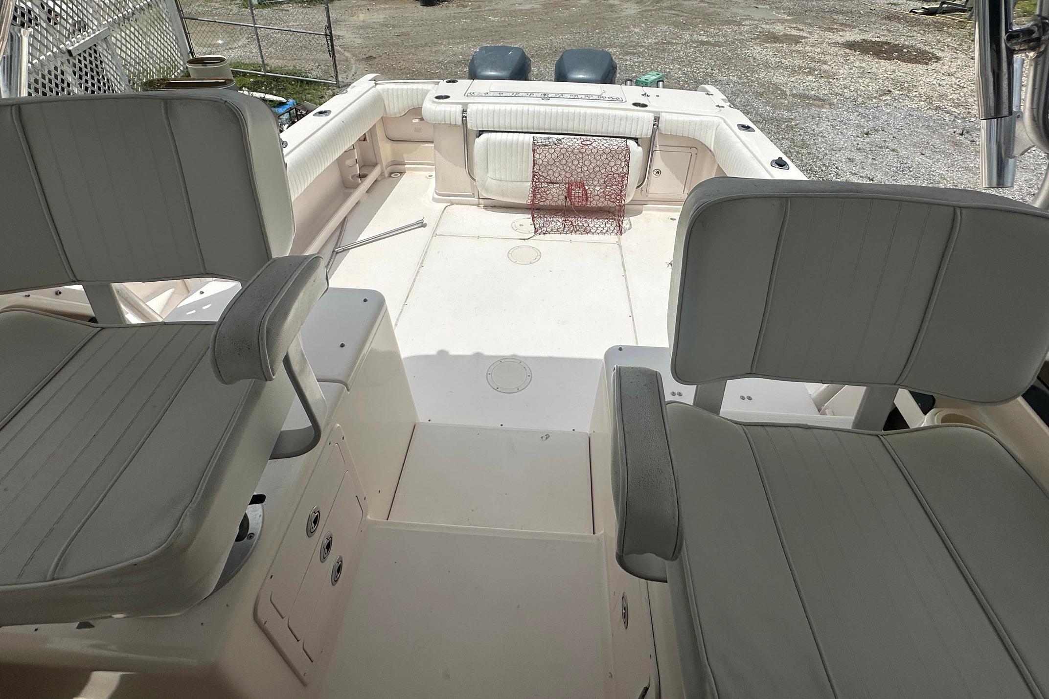 2006 Grady-White Marlin 300 boat interior with seating and fishing equipment.