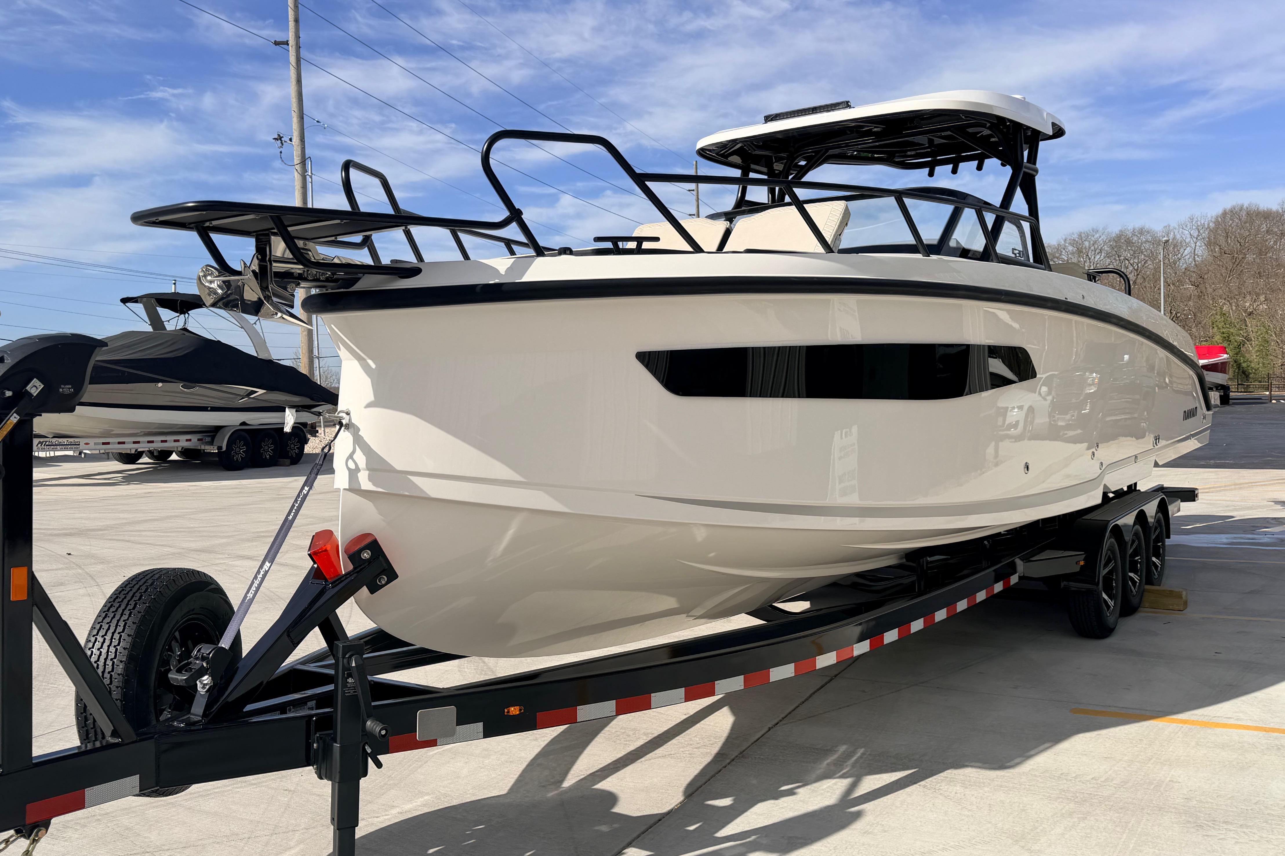 2026 Navan S30 boat on trailer in outdoor setting, showcasing sleek design.