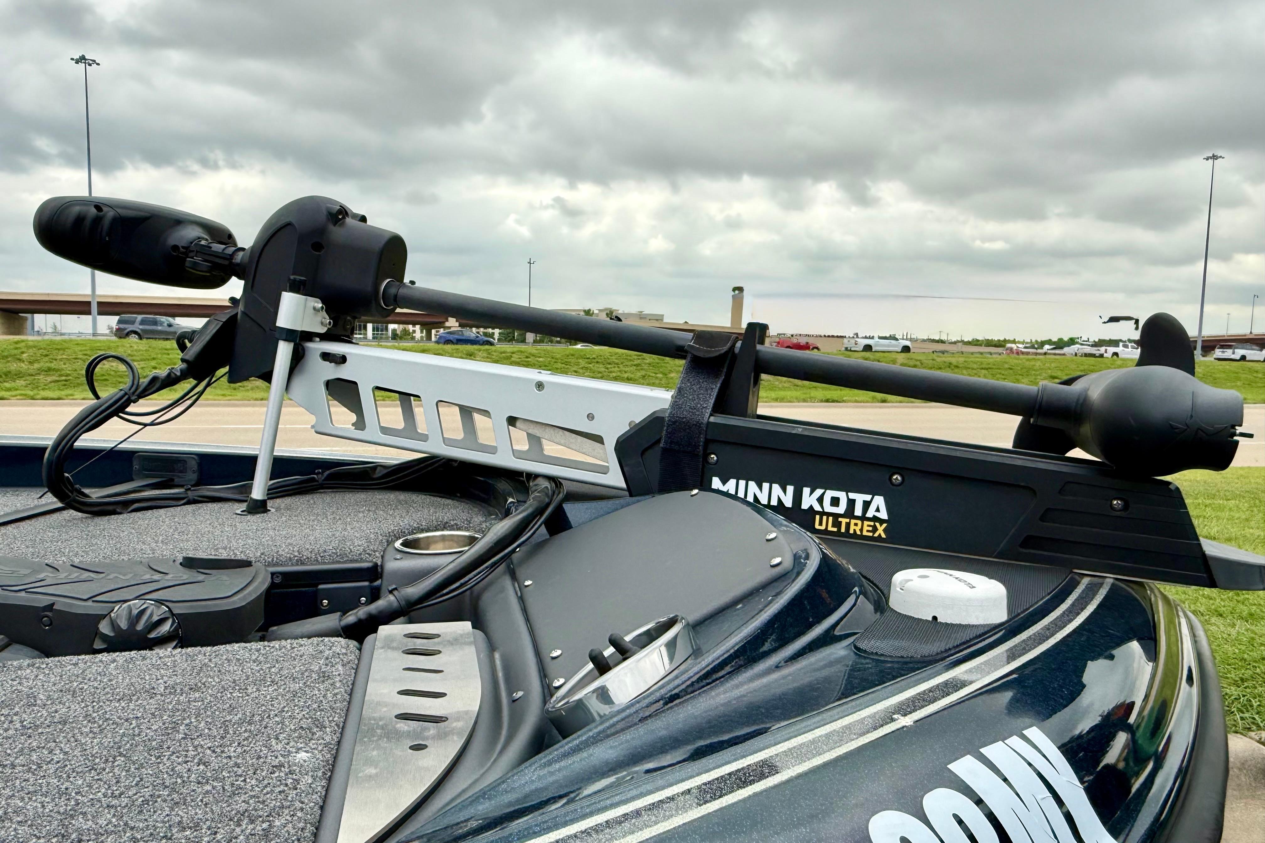 2023 Triton 18 TrX boat with Minn Kota Ultrex trolling motor on deck.