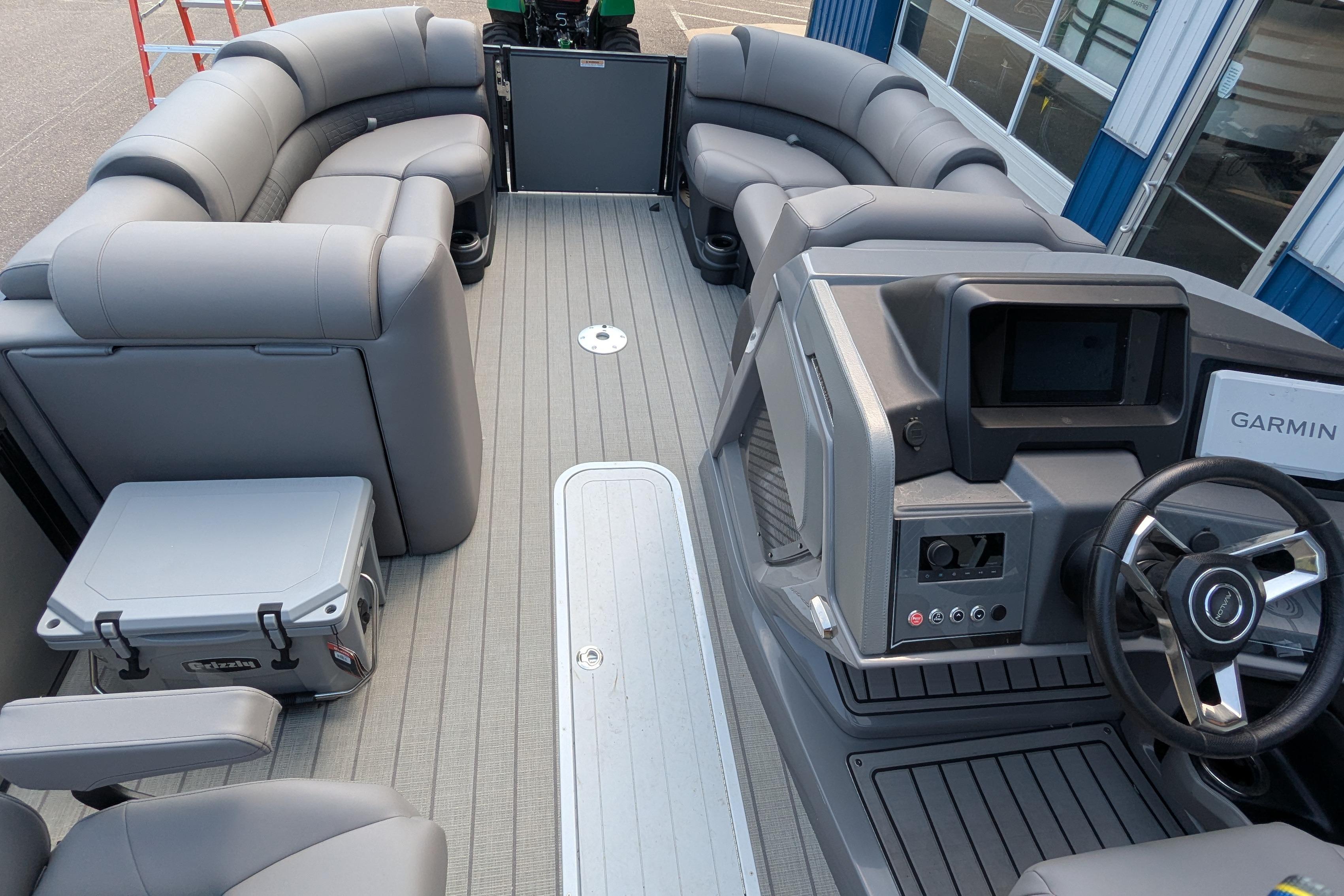 2025 Avalon Catalina Versatile Rear Lounger interior with gray seating and modern dashboard.