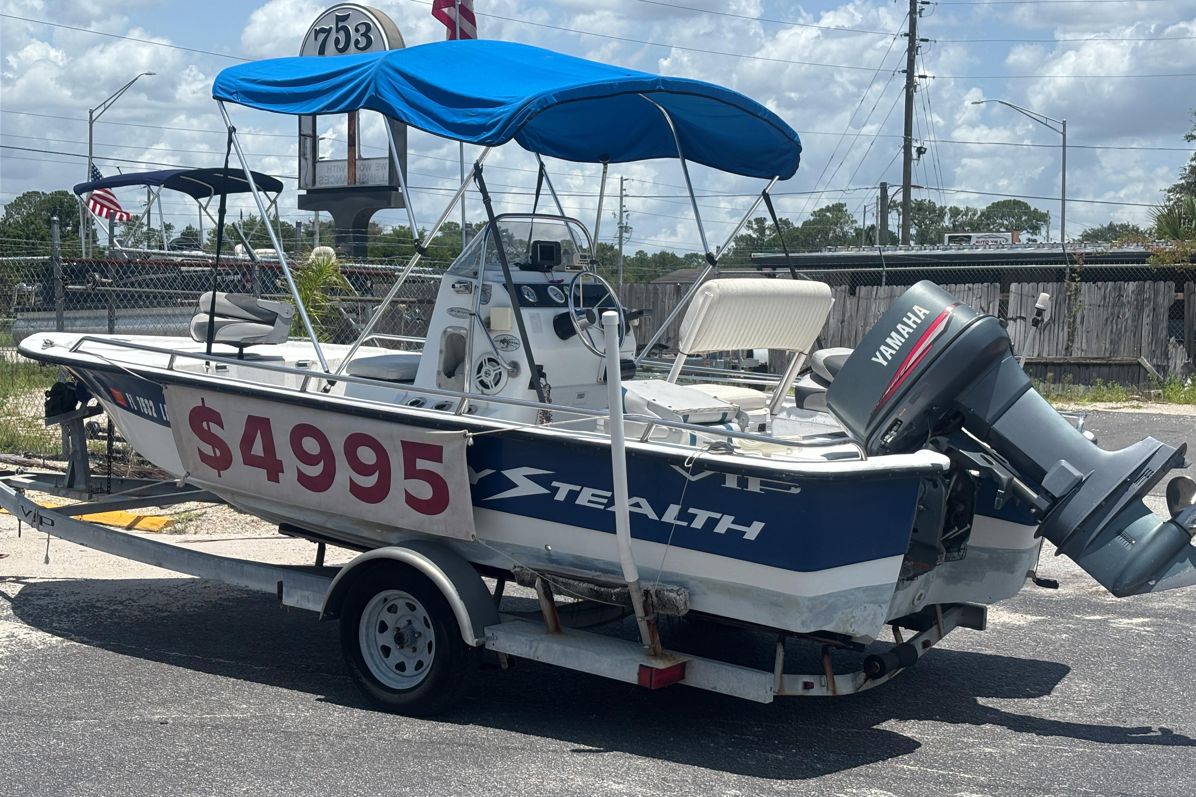 2000 VIP 1880 Bay Stealth boat with Yamaha motor, priced at $4995, on trailer.