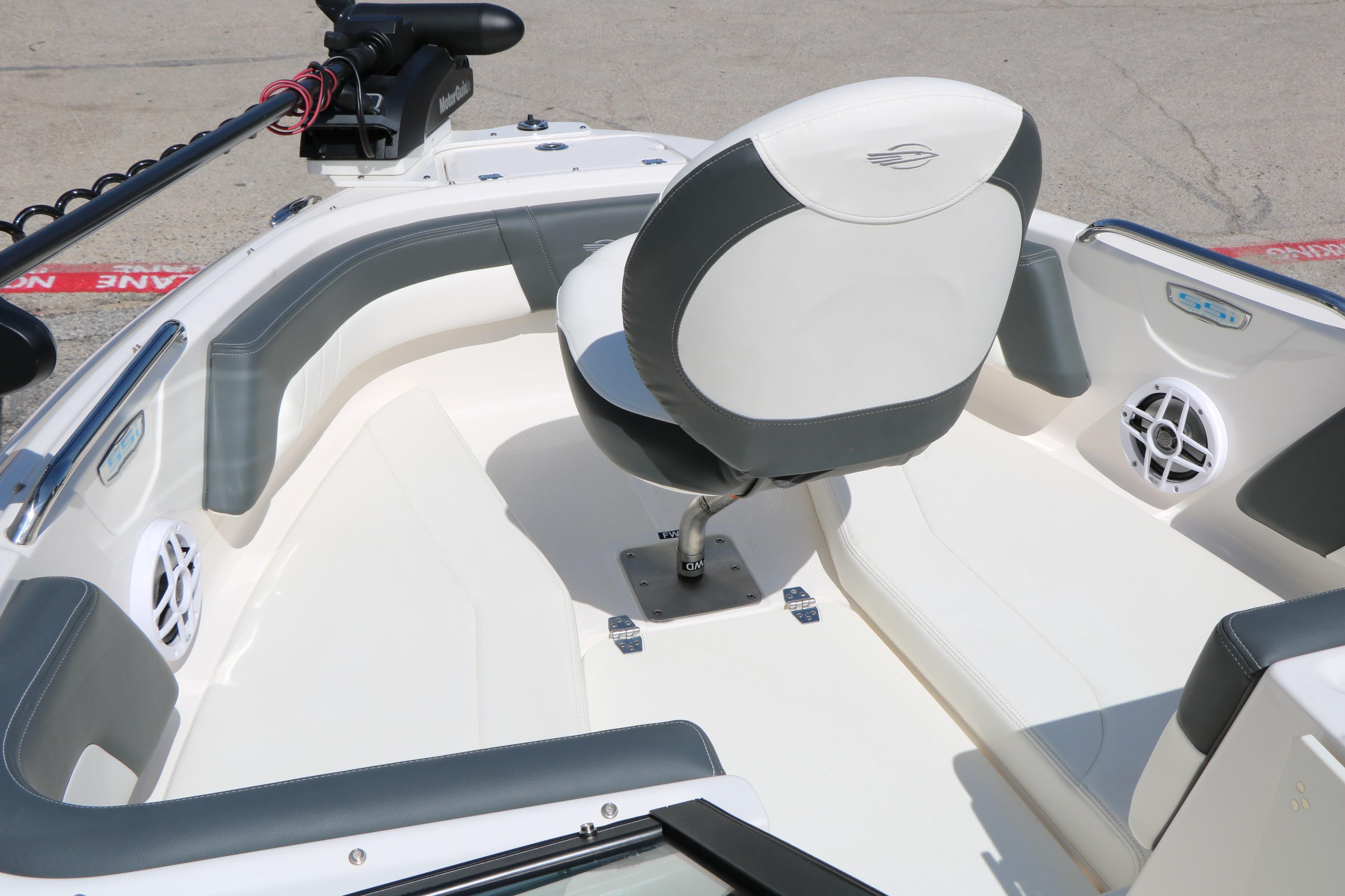 2025 Chaparral 21 SSi Ski & Fish boat interior with seating and speakers.