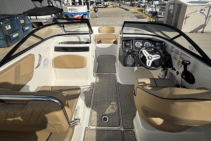 2023 Bayliner VR5 Bowrider OB interior with tan seating and modern dashboard.