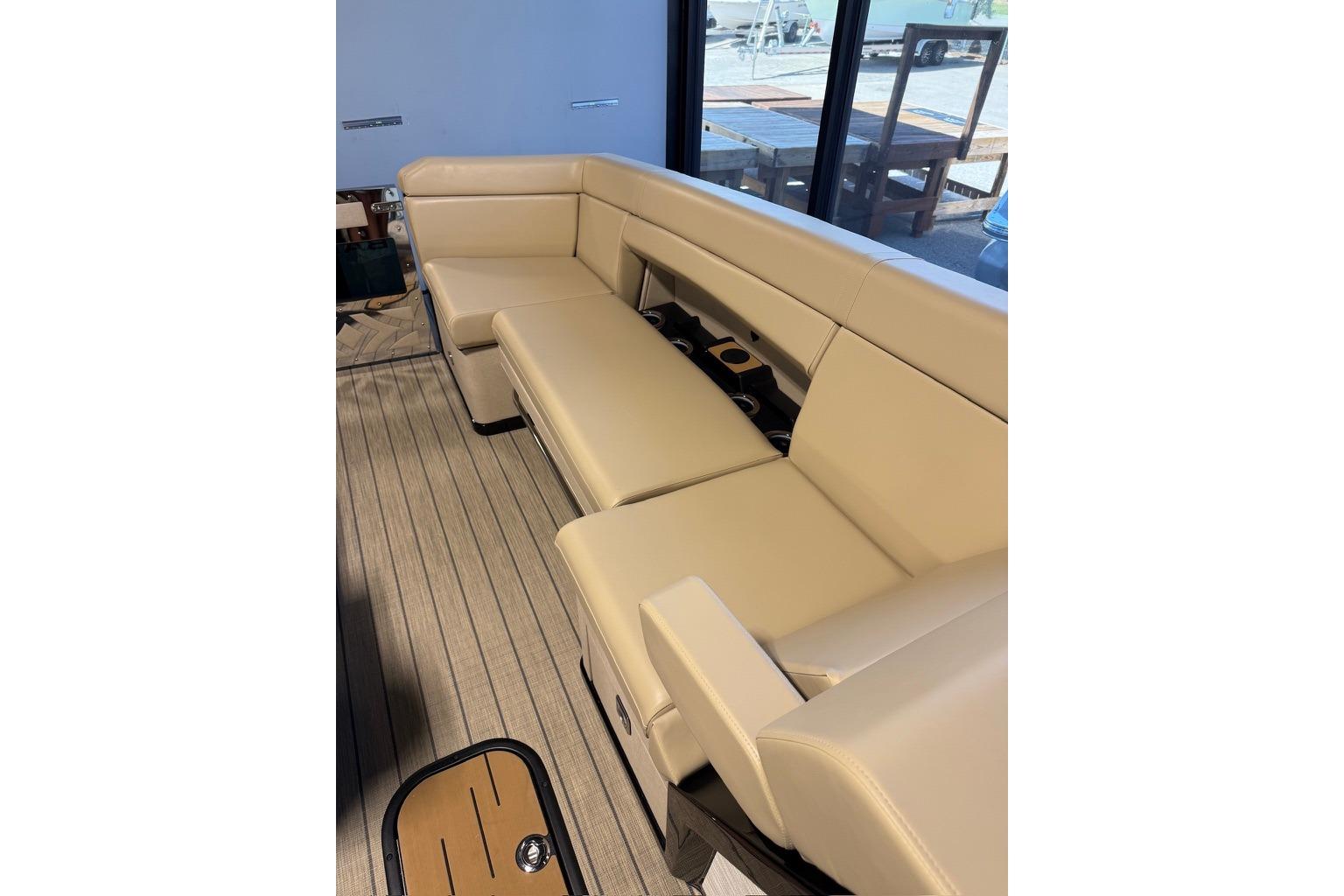 Luxurious beige seating on 2026 Balise Halo 26C Twin boat, featuring sleek design and comfort.