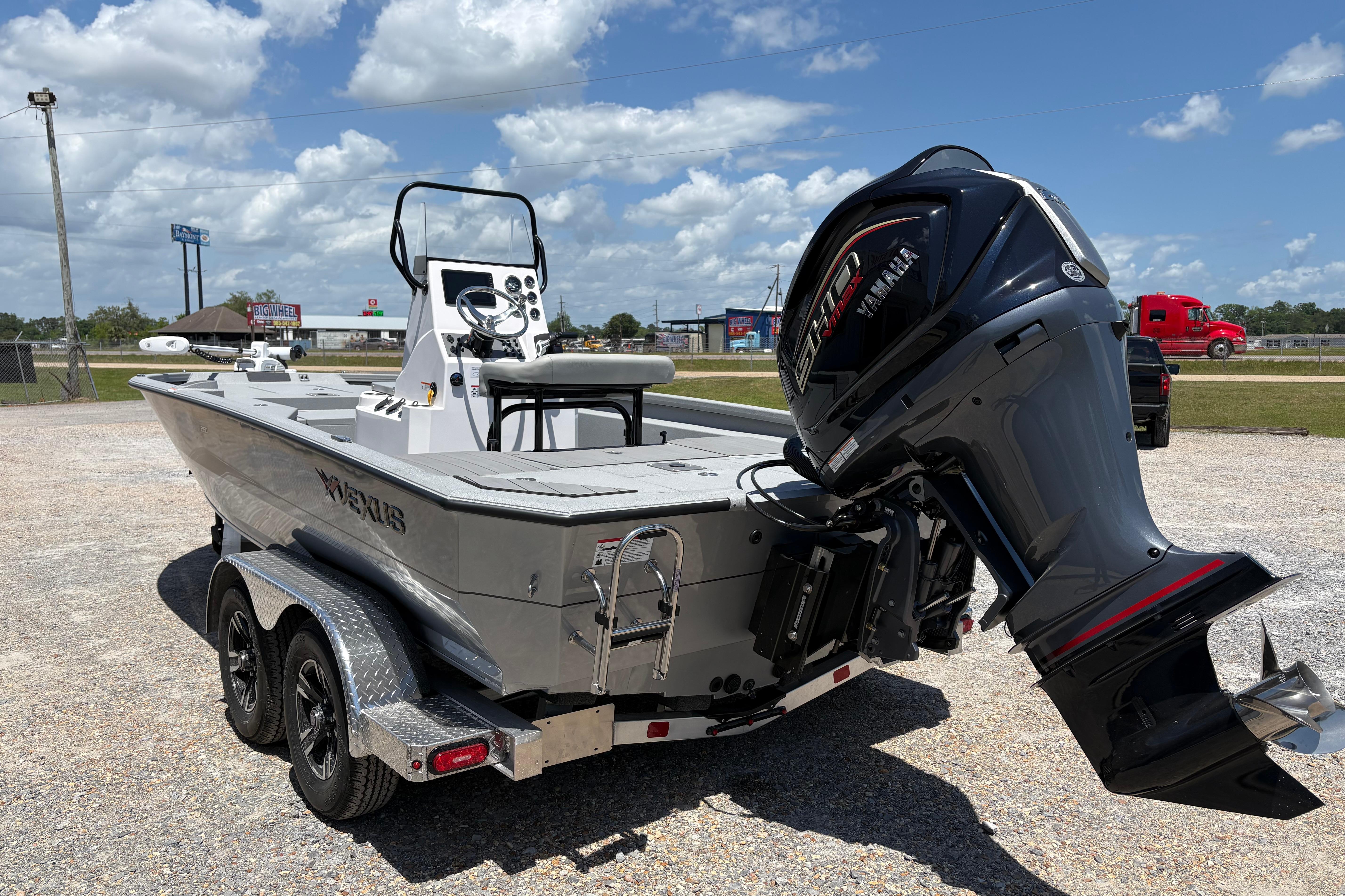 2026 Vexus ACX 2150 boat with Yamaha outboard motor on a trailer.
