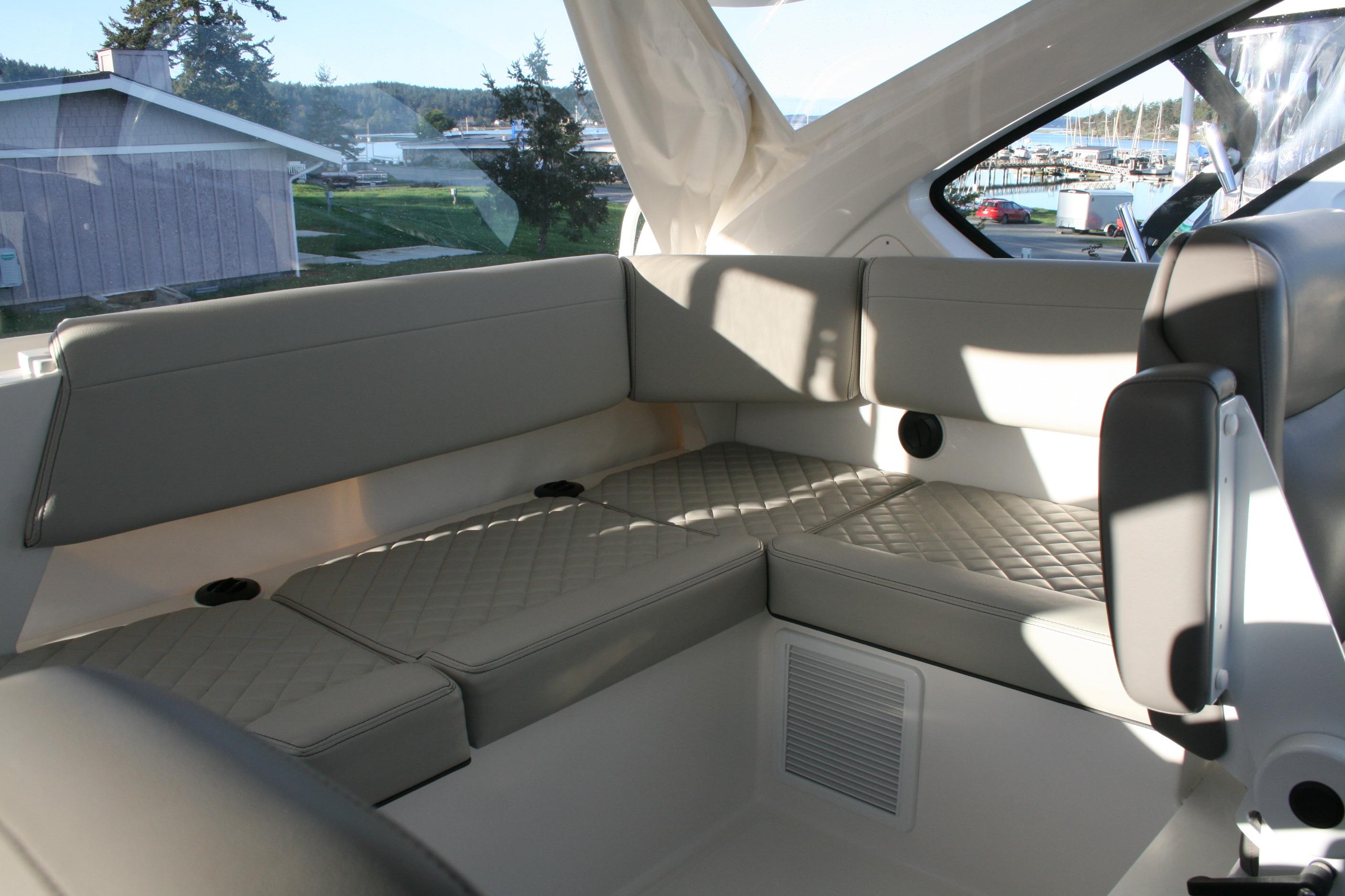 Luxurious seating area on the 2025 Pursuit OS 405 Offshore boat.