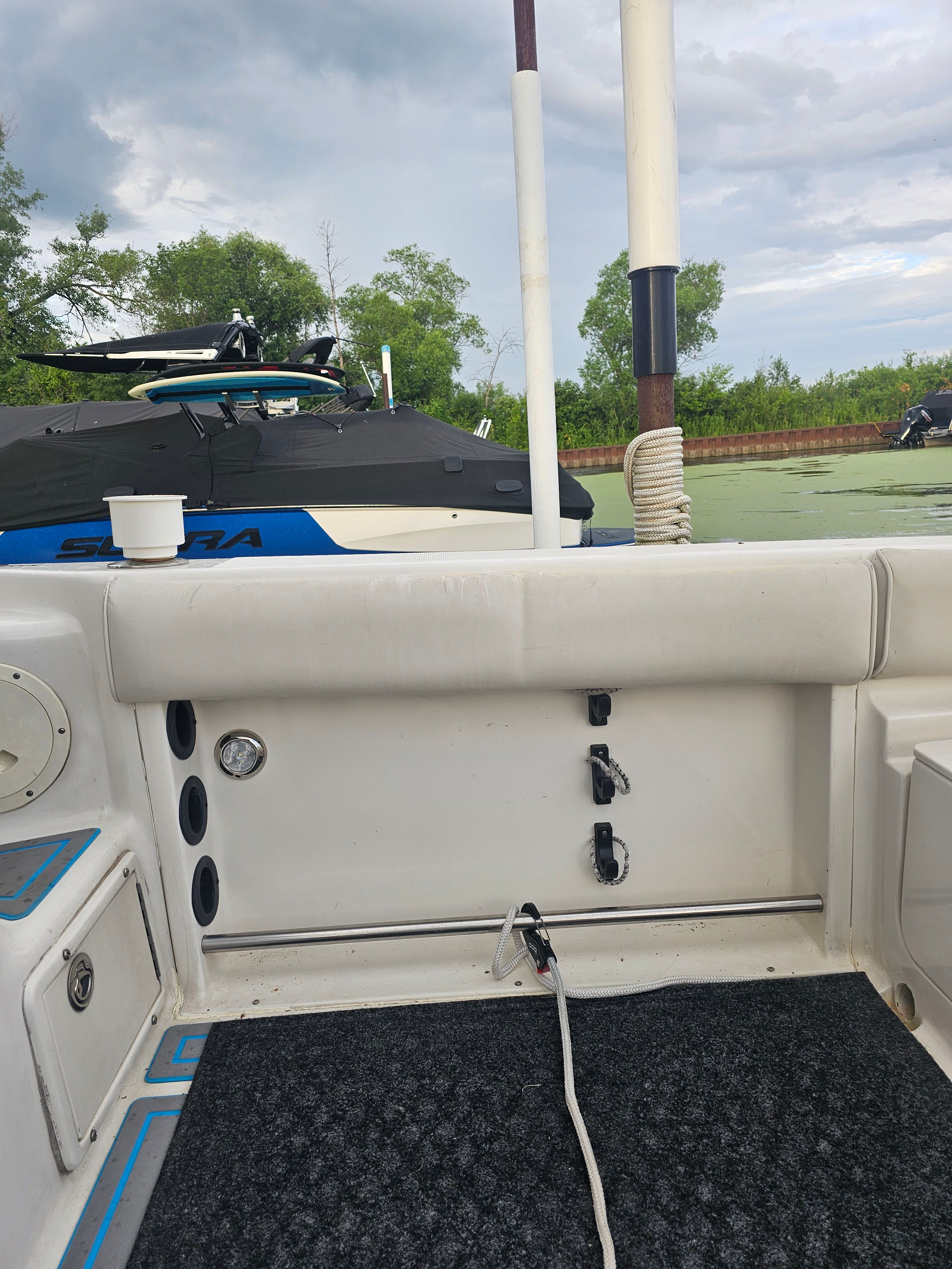 Interior view of a 2005 Robalo R265 Walkaround boat at dock.