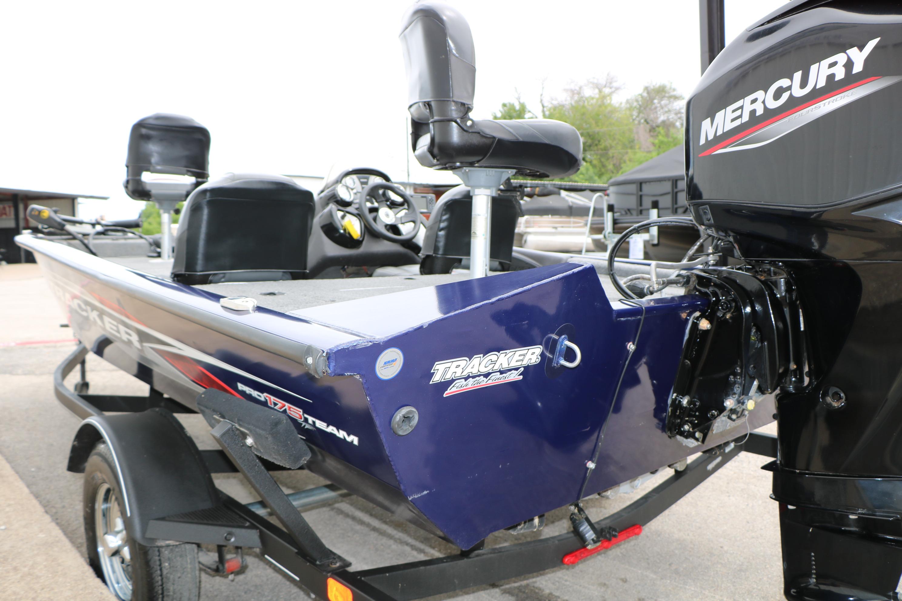 2022 Tracker Pro Team 175 TF boat with Mercury engine, parked on a trailer.