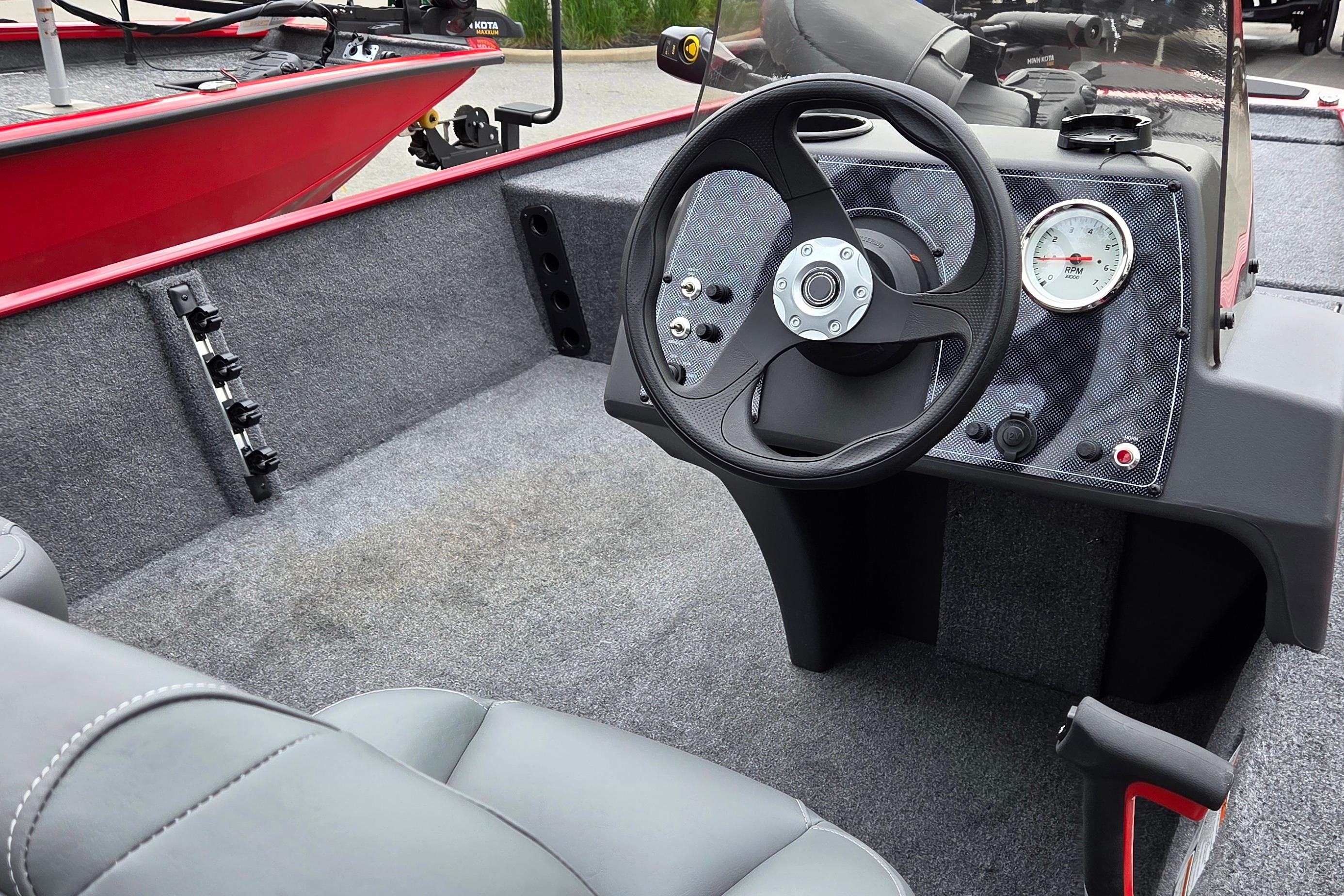 2026 Tracker Bass Tracker Classic XL boat interior with steering wheel and dashboard.