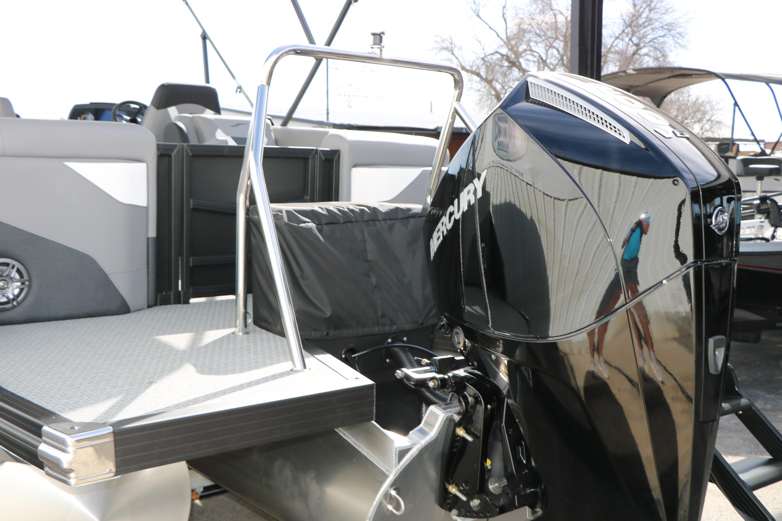 2026 Evotti 521QL boat with Mercury outboard motor, rear deck view.