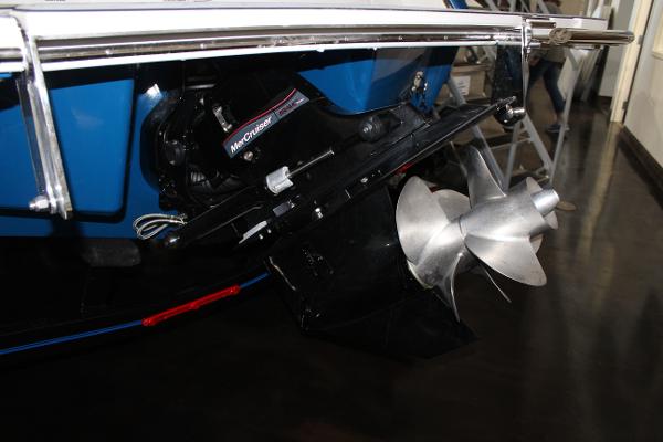 2025 Cobalt R6 boat with MerCruiser engine and dual propellers.