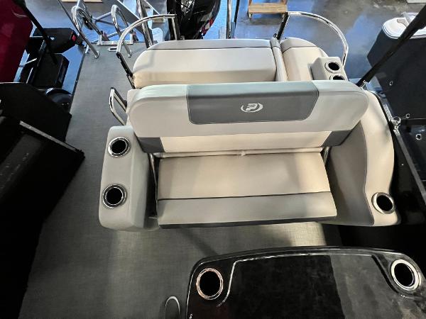 2024 Princecraft Quorum 23 RL boat seating with cup holders, gray upholstery, and sleek design.