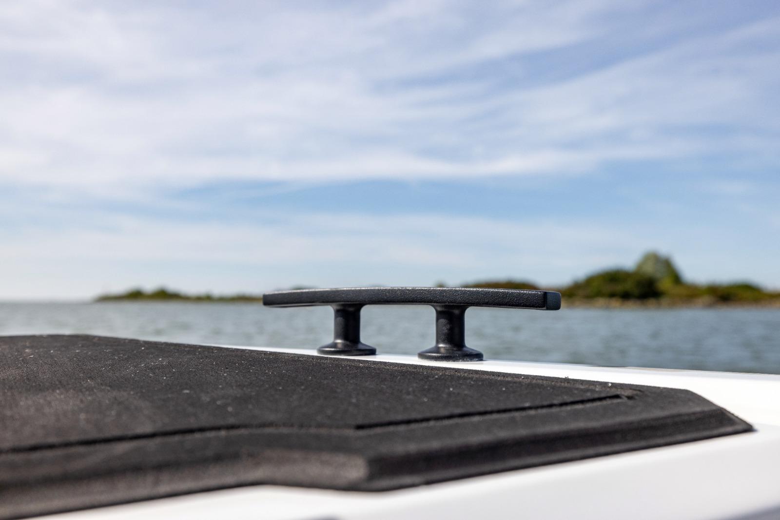 Boat cleat on Iron 707, 2022 model, with scenic water and sky background.