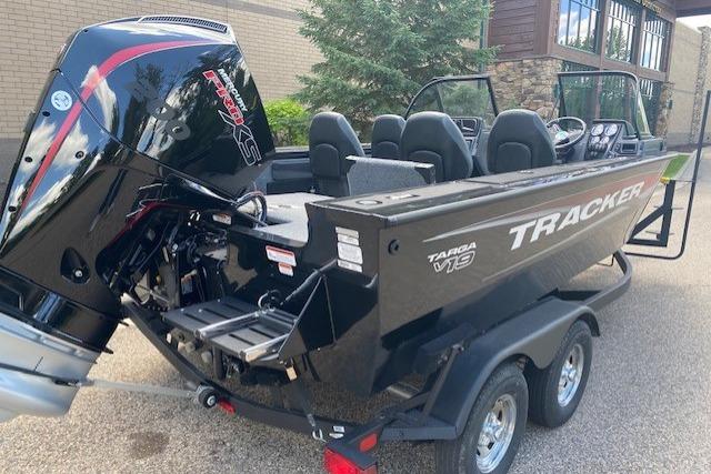 2025 Tracker Targa V-19 Combo boat on trailer, featuring powerful outboard motor.