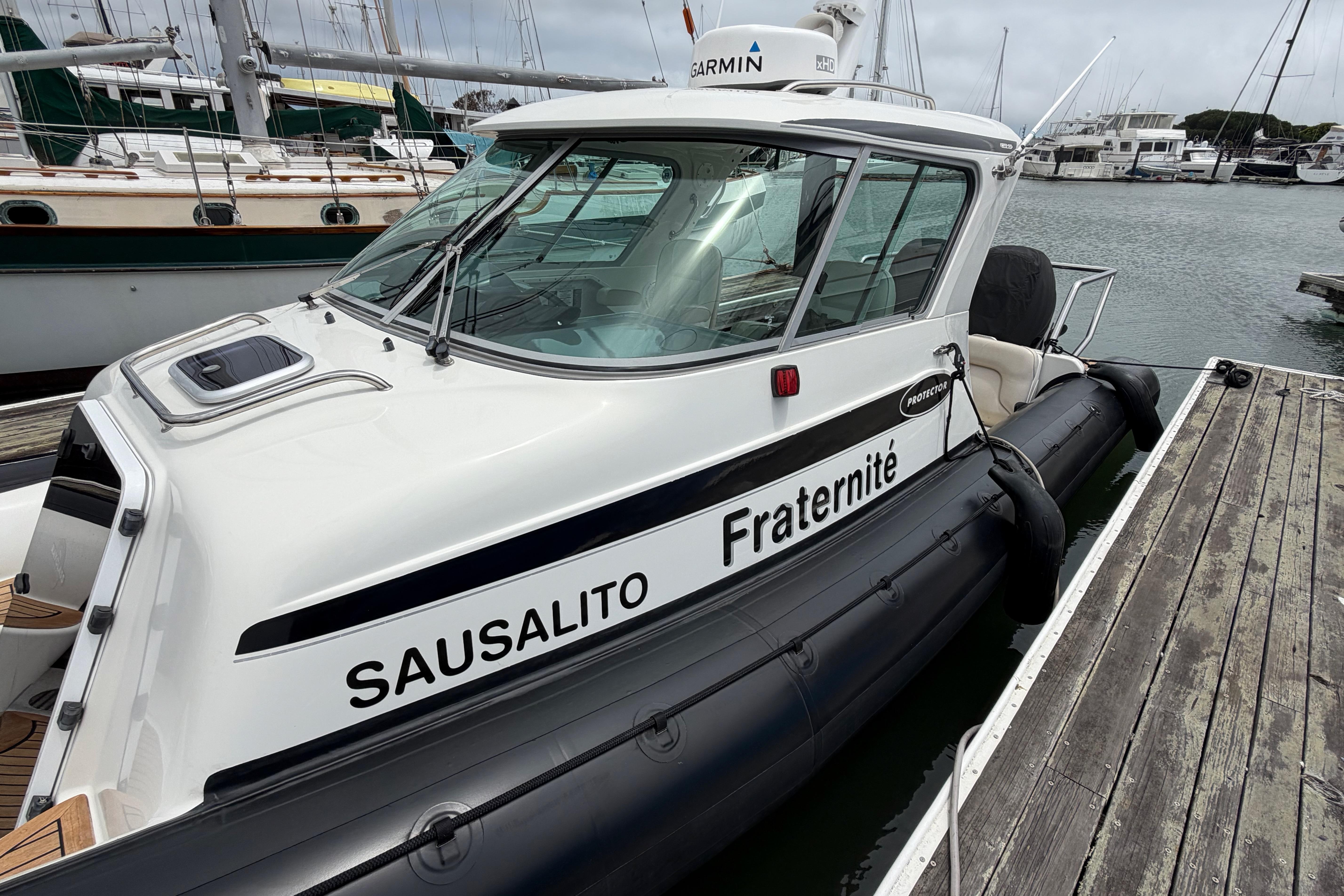 2016 Protector Targa 30 boat docked in Sausalito marina.