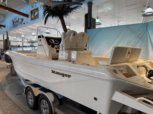 2025 Ranger 2660 Bay boat displayed indoors on a trailer.