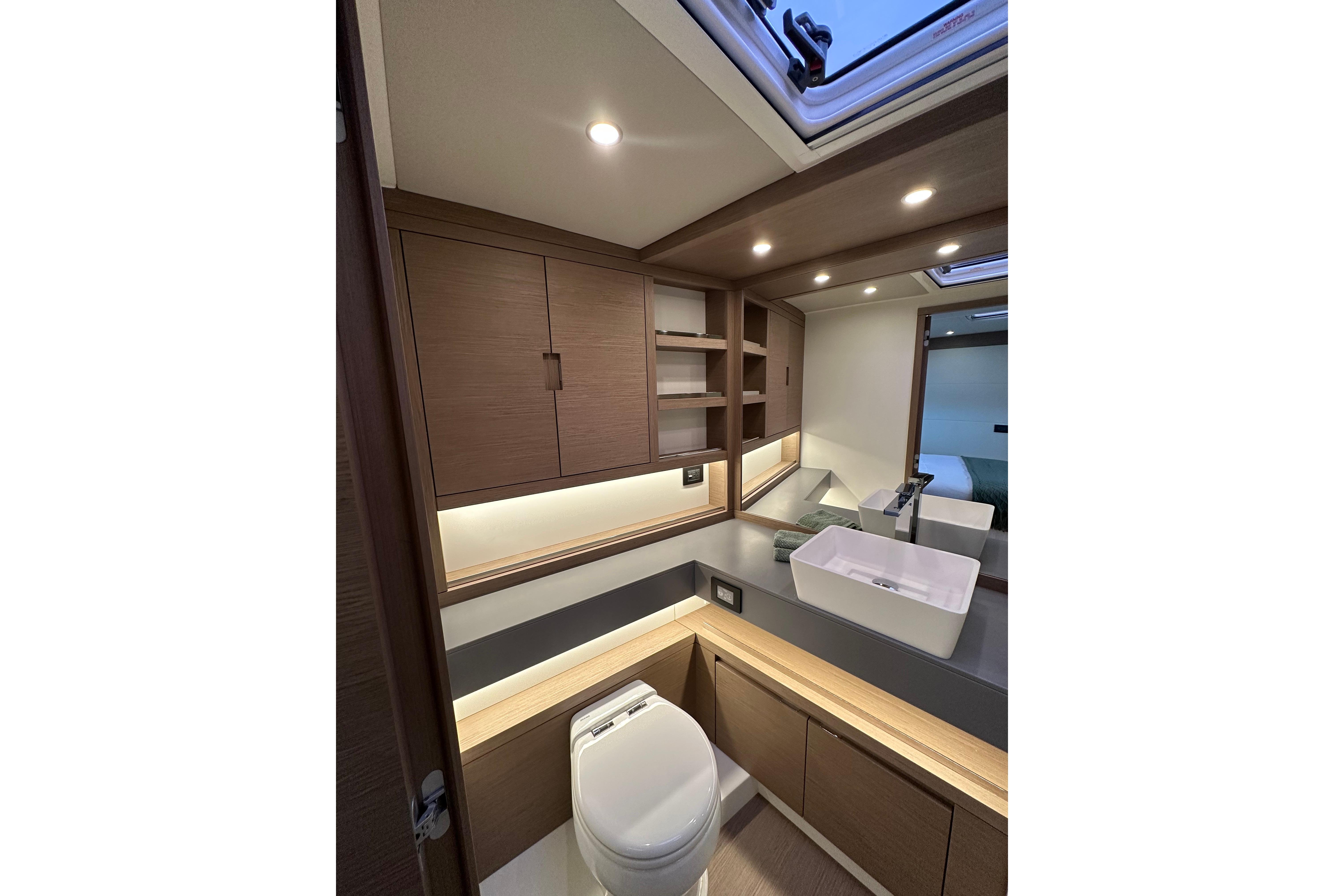 Luxurious bathroom interior of 2026 Pardo Yachts GT52 with modern fixtures and wood accents.