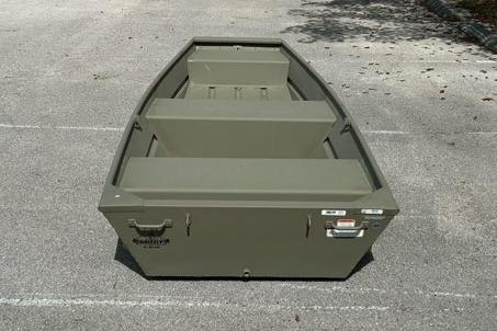 2026 Tracker Grizzly 12 Jon boat on pavement, showcasing its sturdy design.