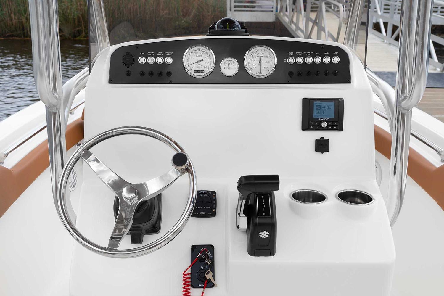 Manufacturer Provided Image: 2025 Pioneer 202 Islander boat dashboard with steering wheel, gauges, and controls.