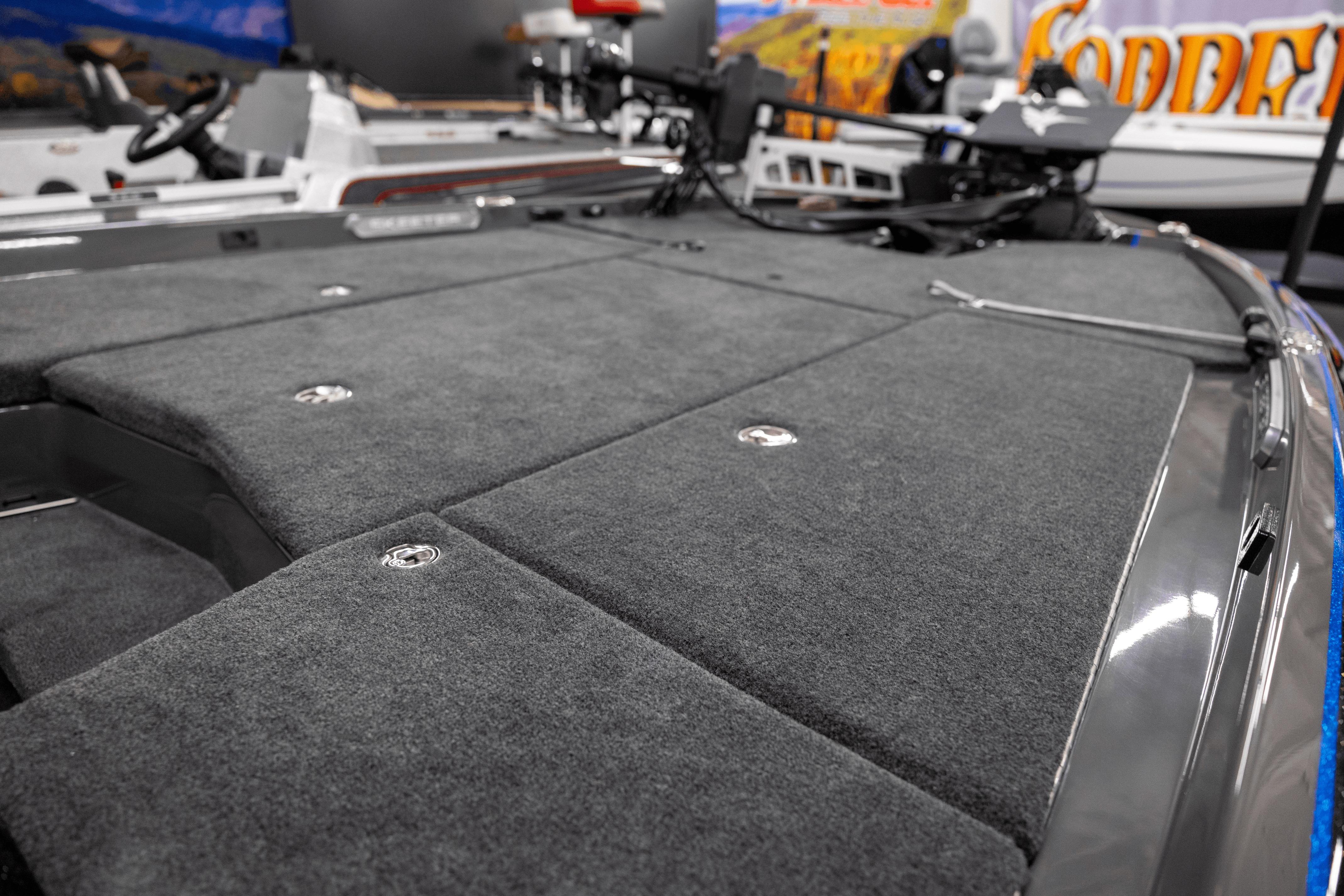 2026 Skeeter FXR20 Apex boat deck with gray carpet and storage compartments.