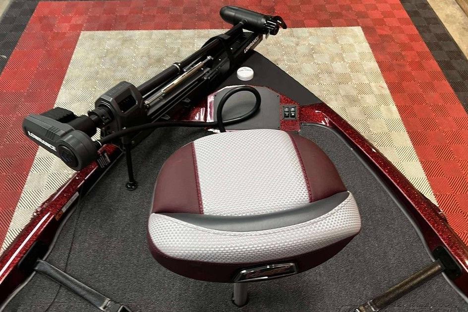 2026 Ranger Z185 boat seat and trolling motor on patterned flooring.