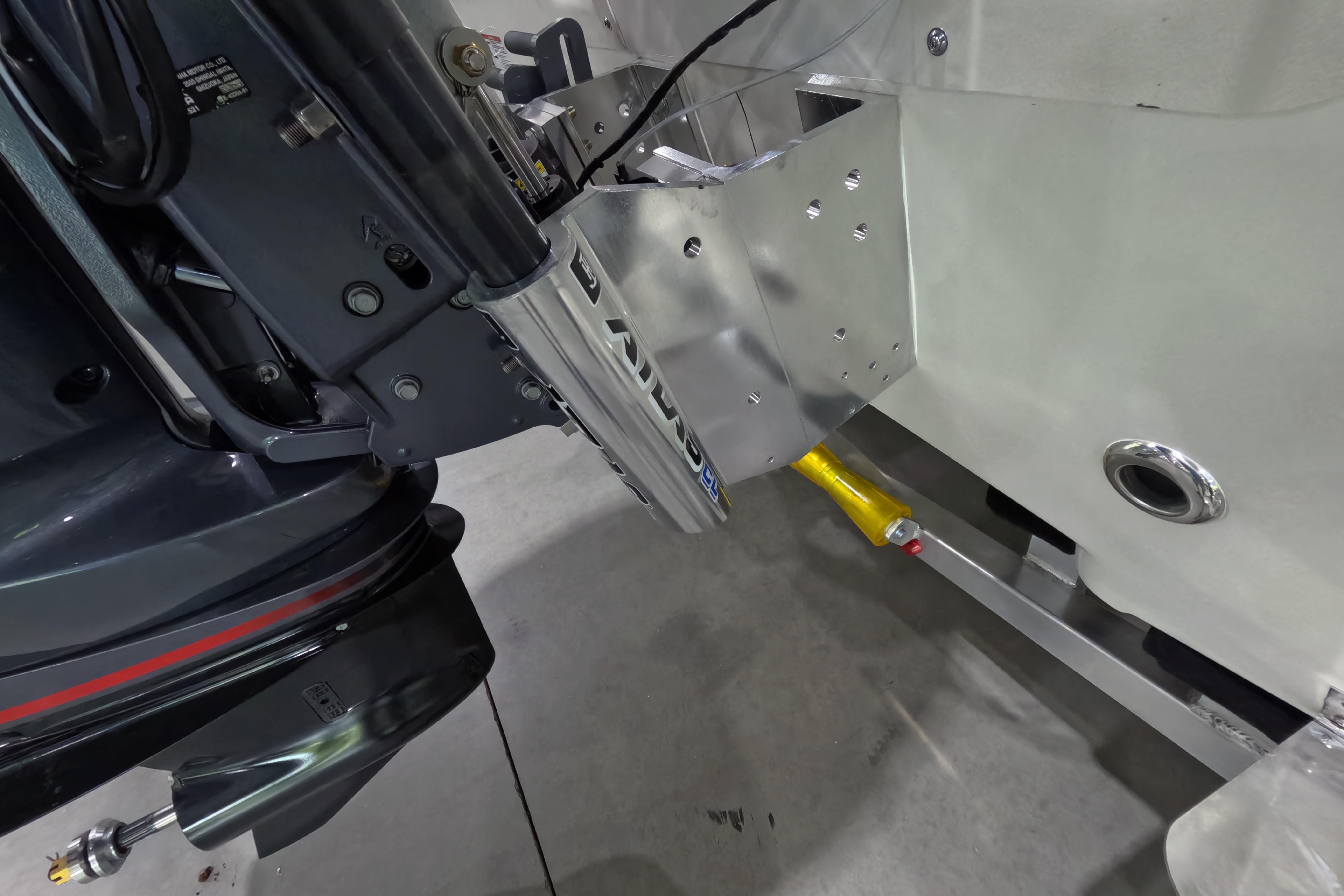 2026 Skeeter SX221 boat motor mount and transom detail in a garage setting.