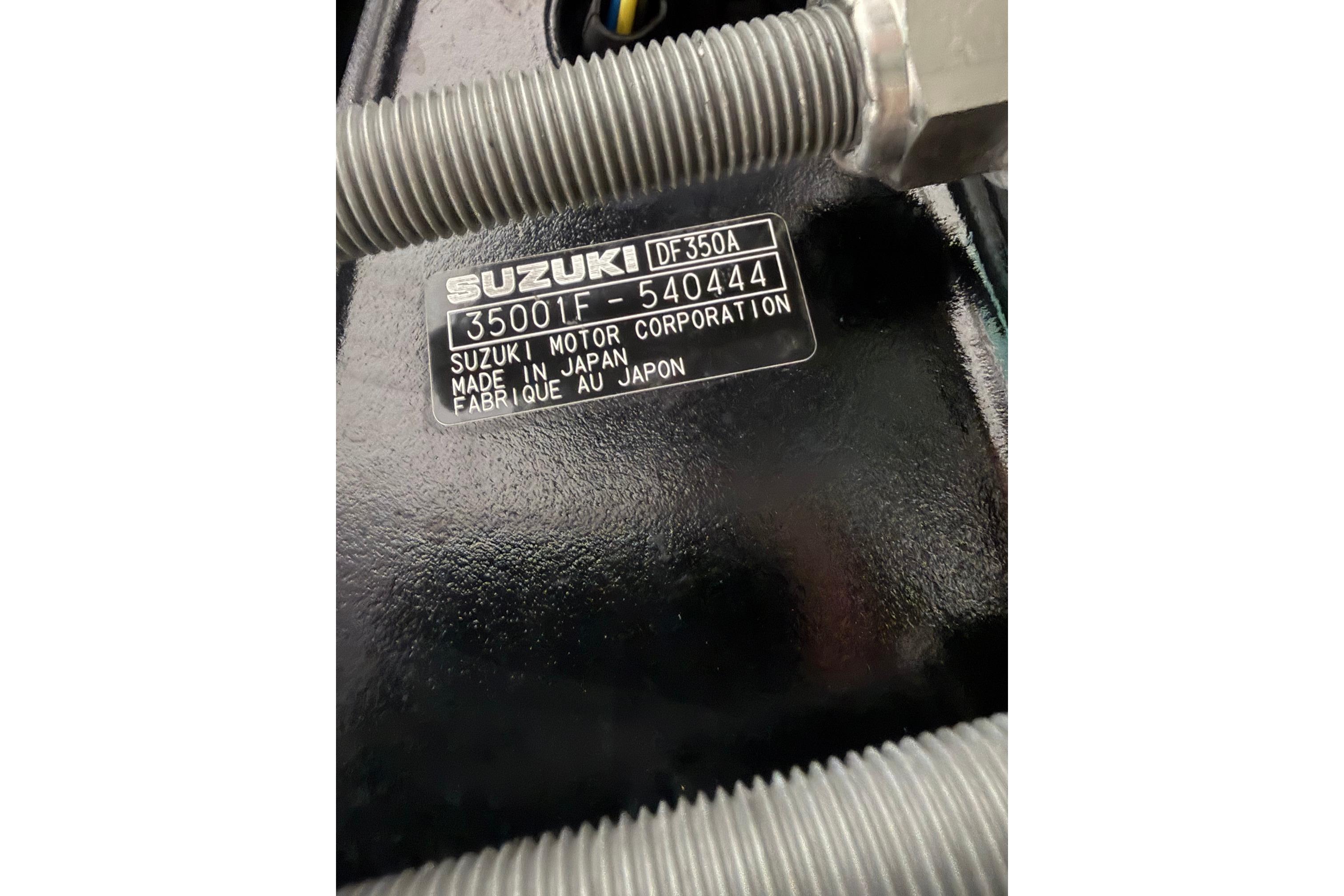 Label on Suzuki DF350A engine, serial number 35001F-540444, made in Japan.