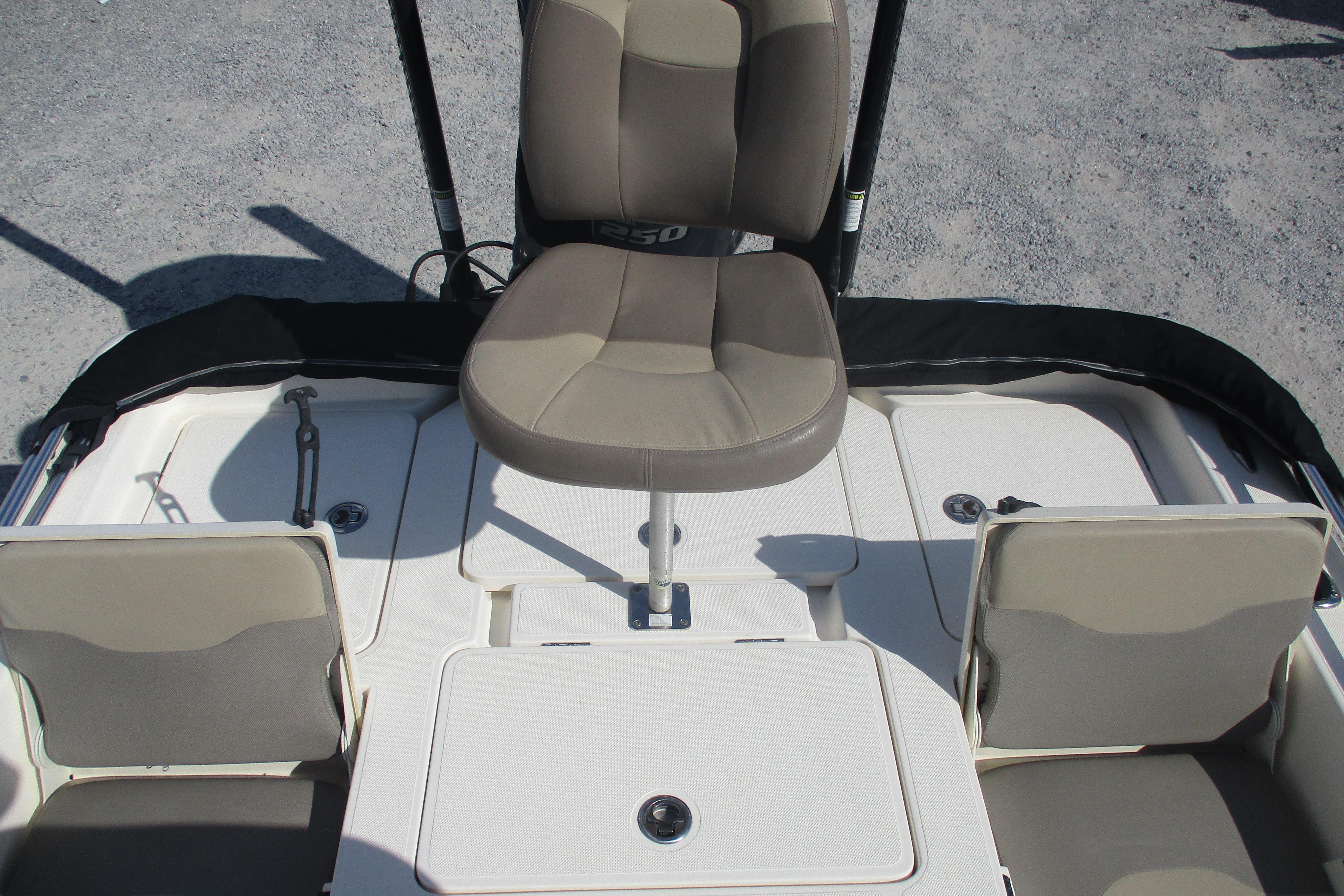 2014 Skeeter SX240 boat interior with seating and storage compartments.
