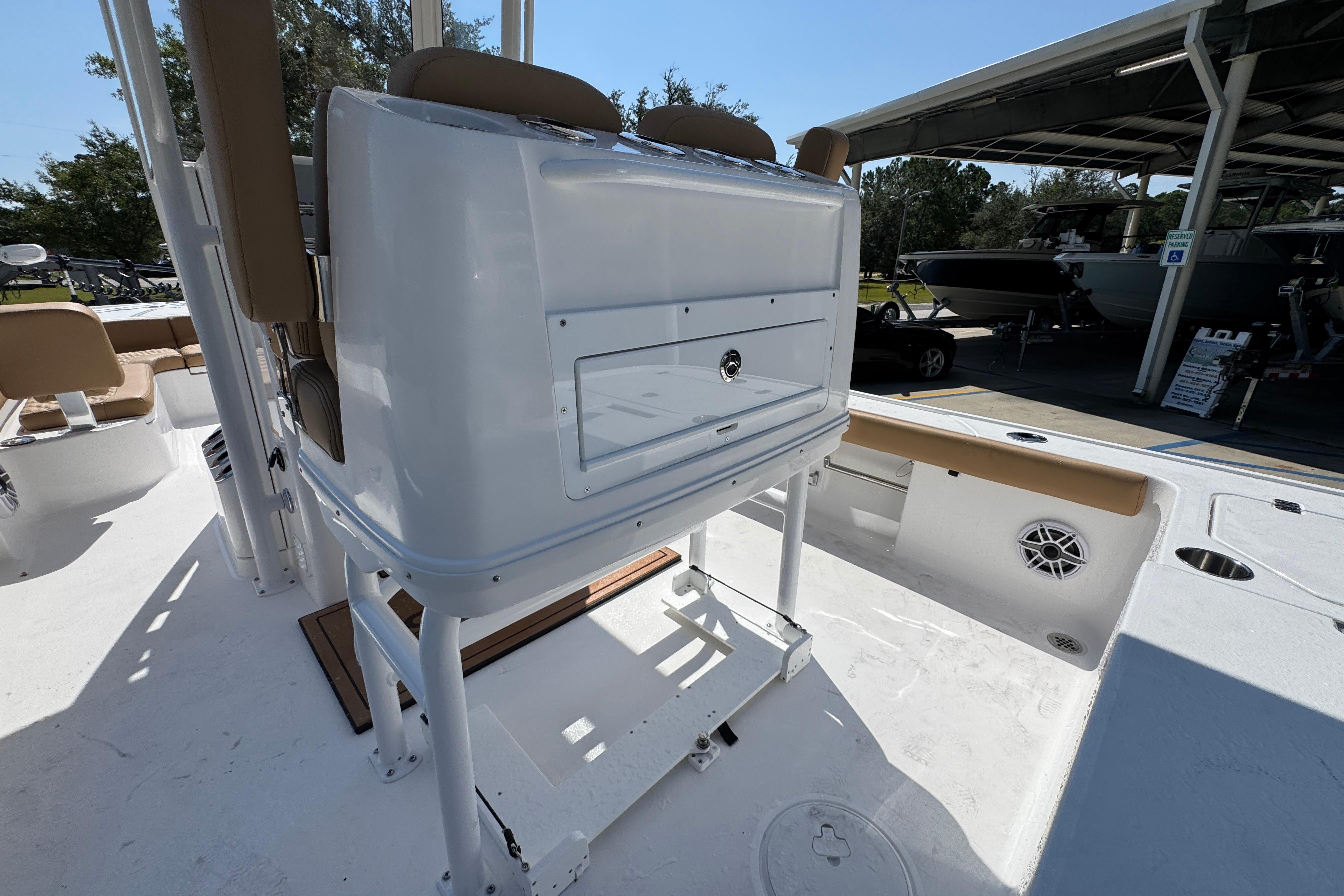 2027 Caymas 26 HB boat interior with seating and storage compartments.