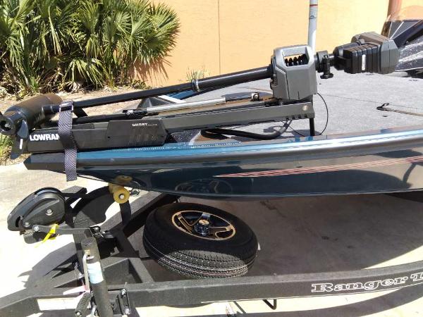2025 Ranger ALPHA 208 boat on trailer with Lowrance equipment, parked outdoors.