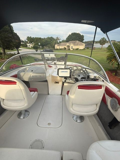 Interior view of a 2012 Bayliner 184 SF boat with helm console.