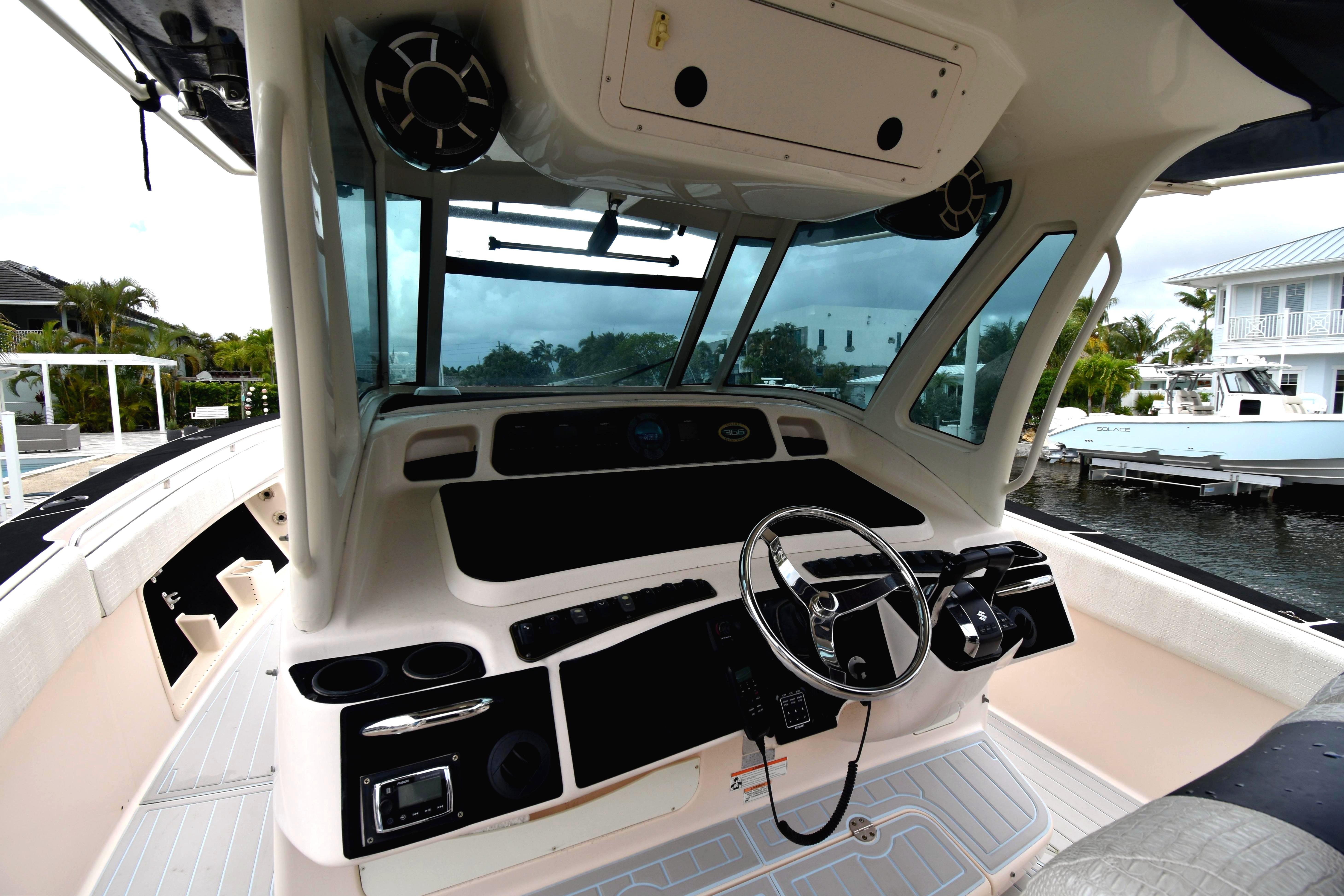 2010 Grady-White Canyon 366 boat helm with steering wheel and controls.