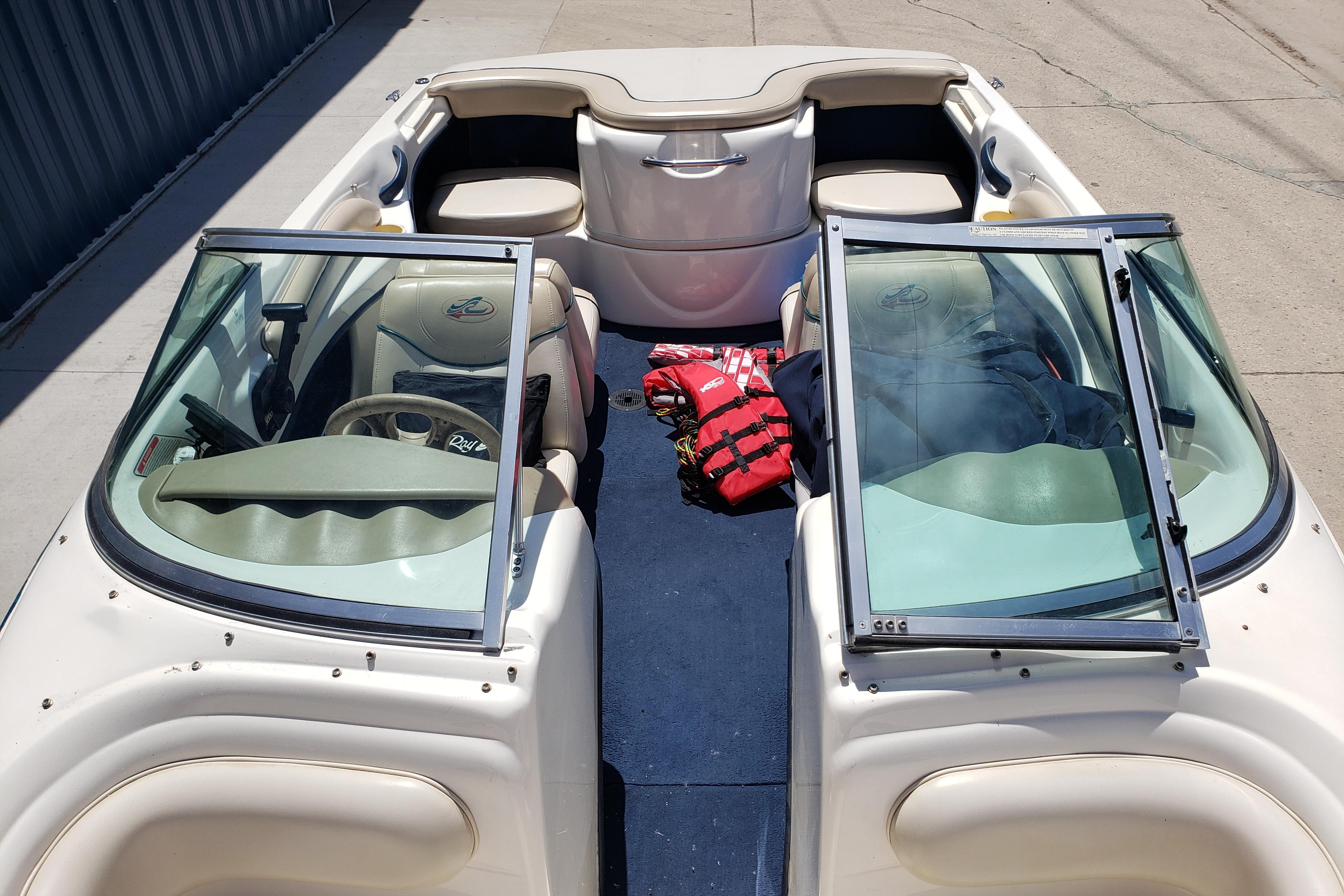 1998 Sea Ray 180 Bow Rider interior with life jackets and seating.