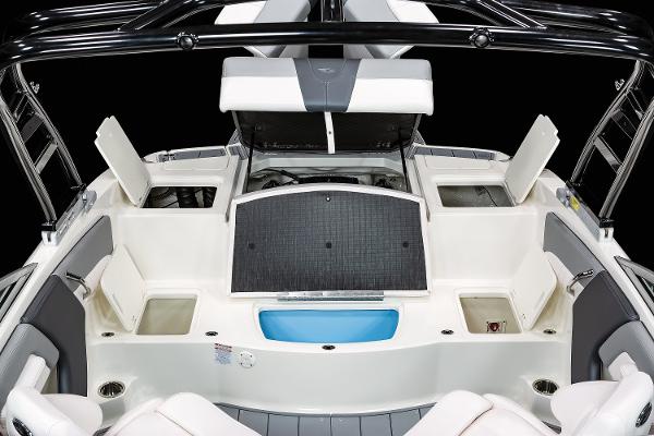 Manufacturer Provided Image: 2025 Chaparral 21 SSi boat interior with storage compartments and seating.