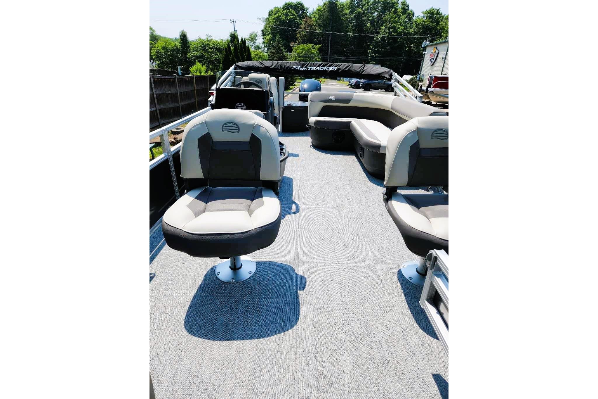2026 Sun Tracker Bass Buggy 18 DLX pontoon boat interior with comfortable seating.